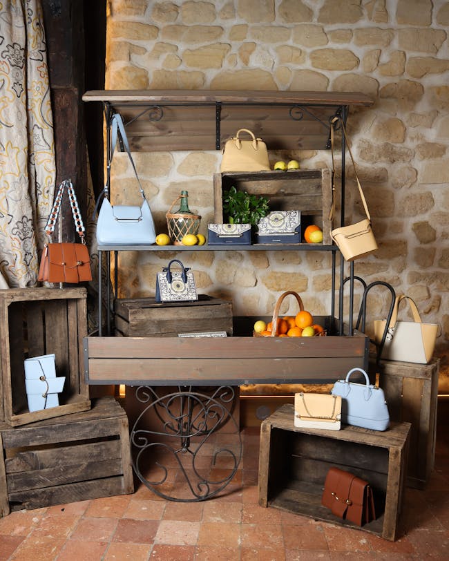 A display of handbags and purses in a store