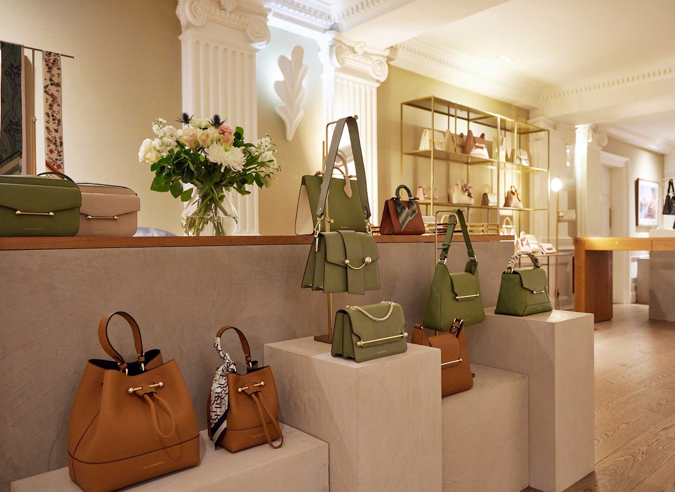 A display of handbags and purses in a store