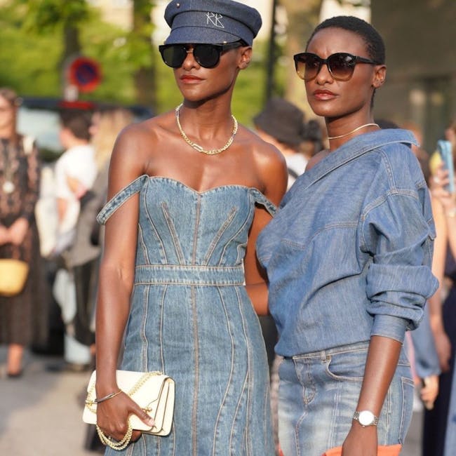 A couple of women standing next to each other