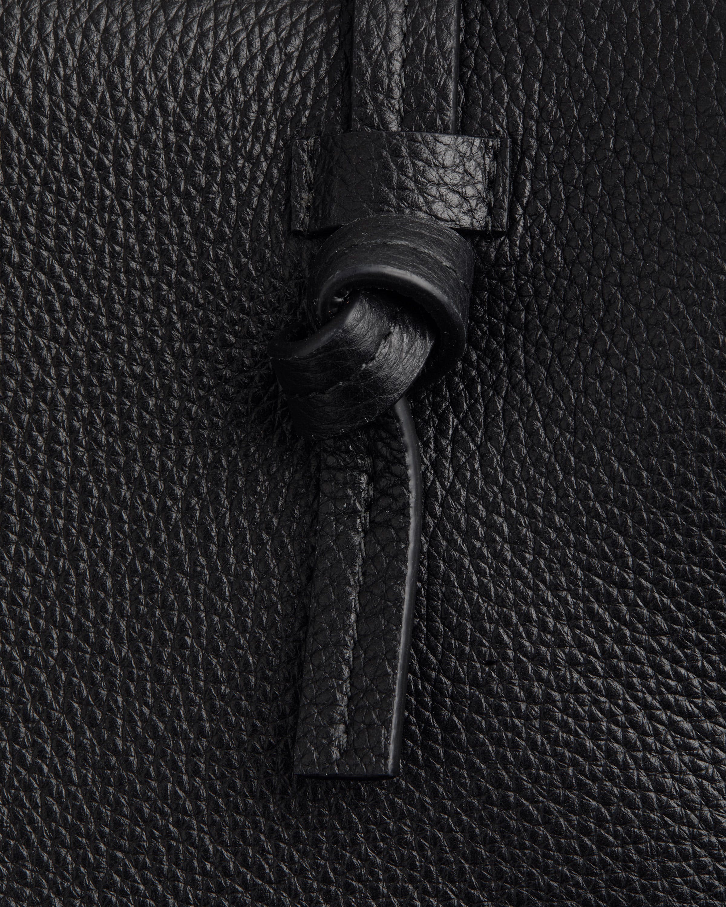 A close up of a black leather bag