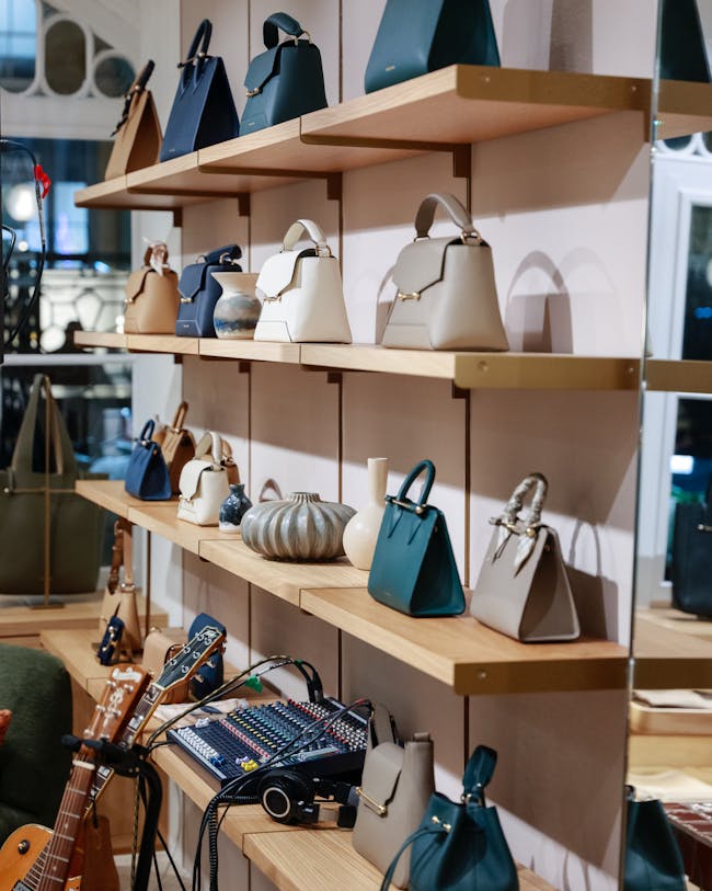 A display of handbags and purses in a store