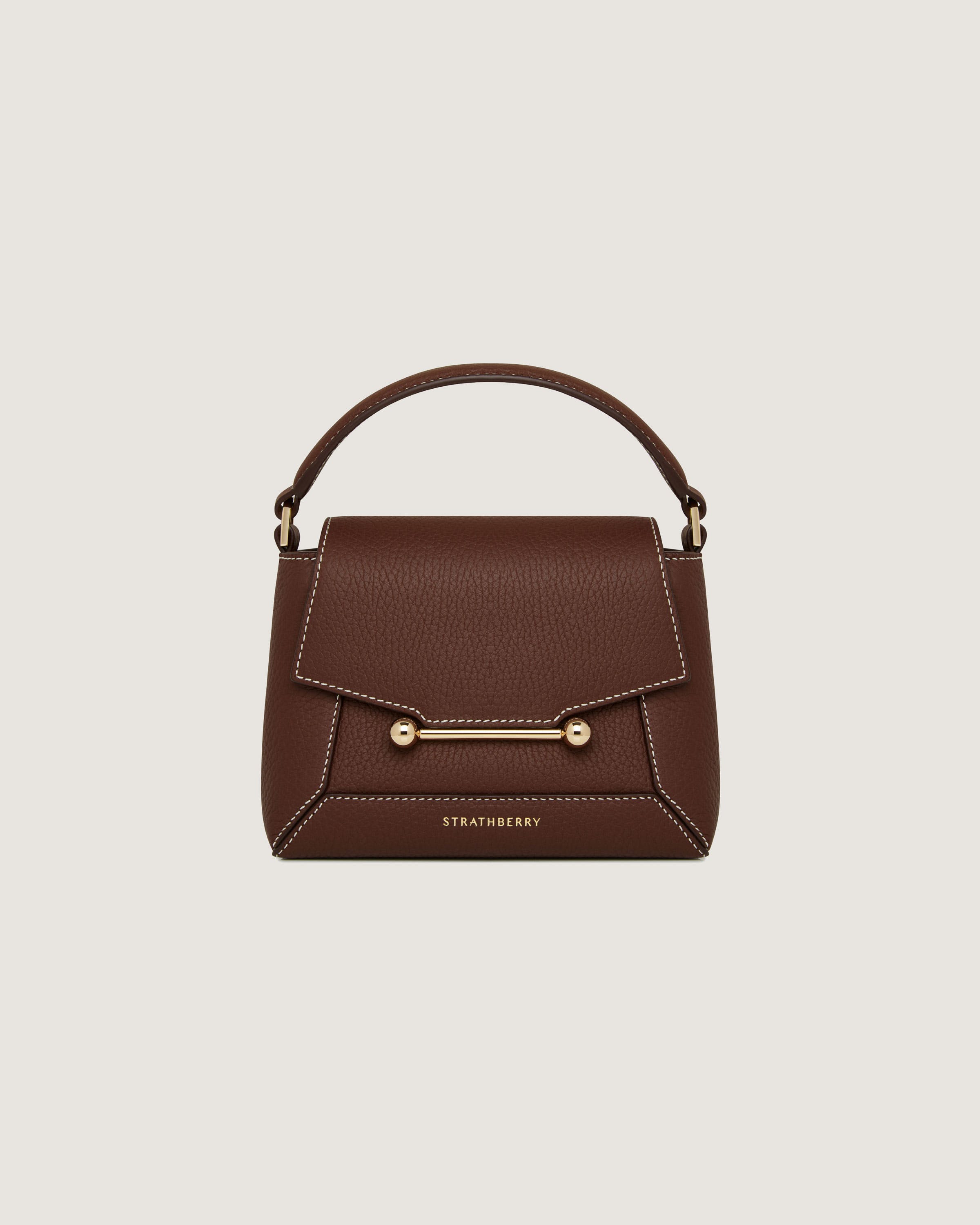 A brown handbag with a handle