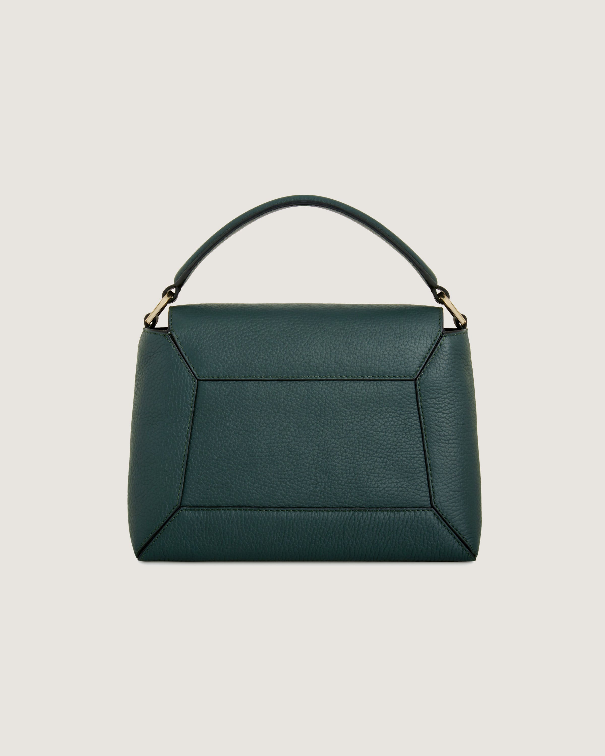 A green handbag on a white background