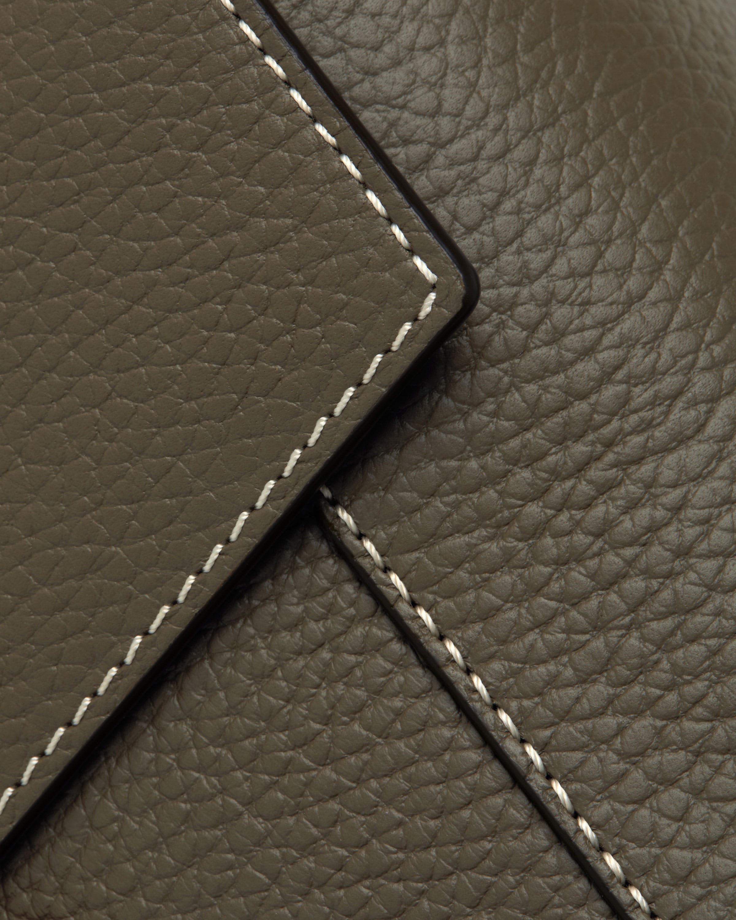 A close up view of a brown leather material