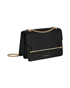 A black handbag with a gold chain strap