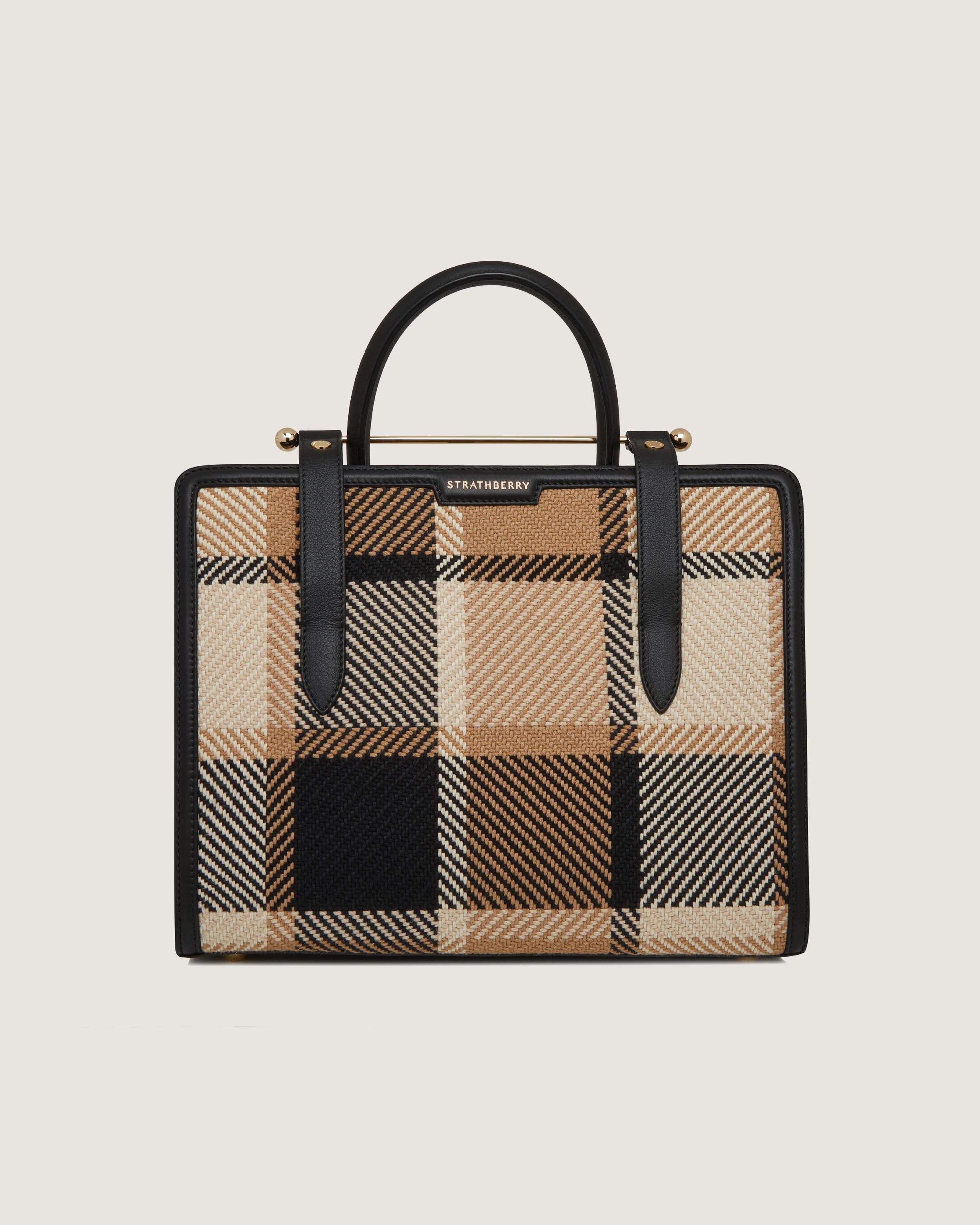 A brown and black checkered bag with a black handle