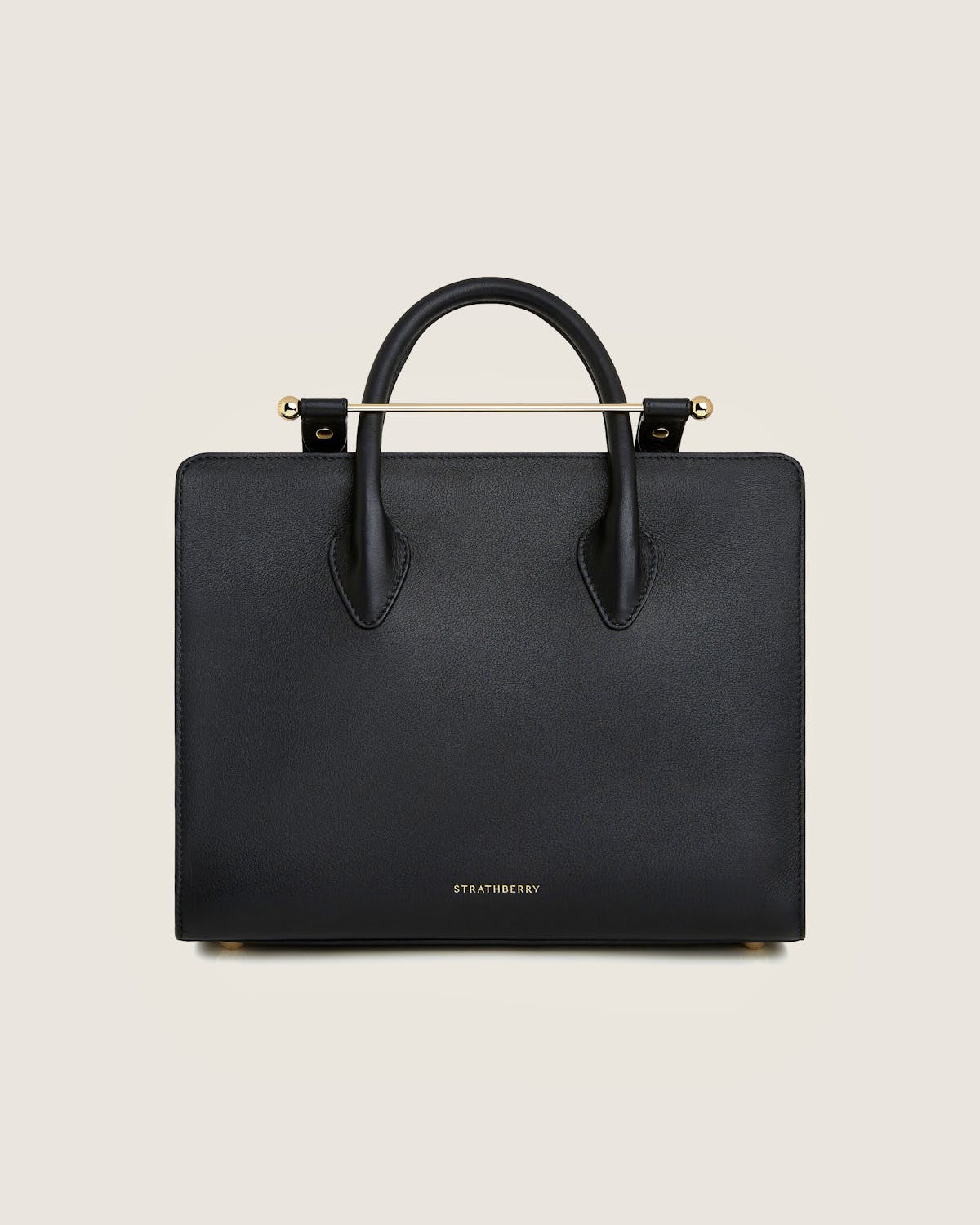 A black handbag with a metal handle