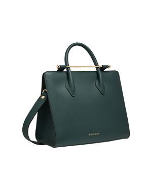 A green handbag with a gold handle