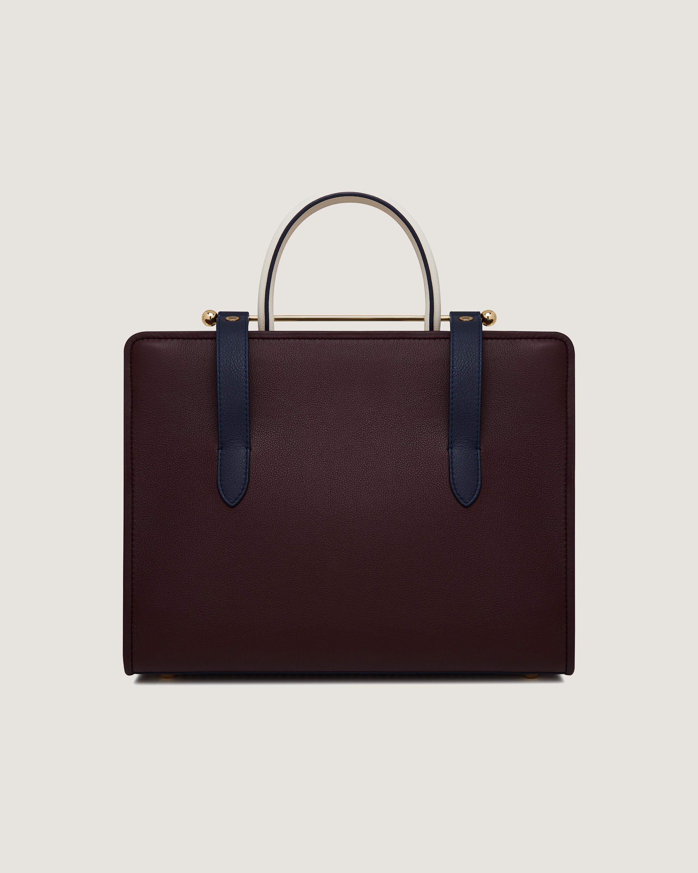 A brown briefcase with a blue handle