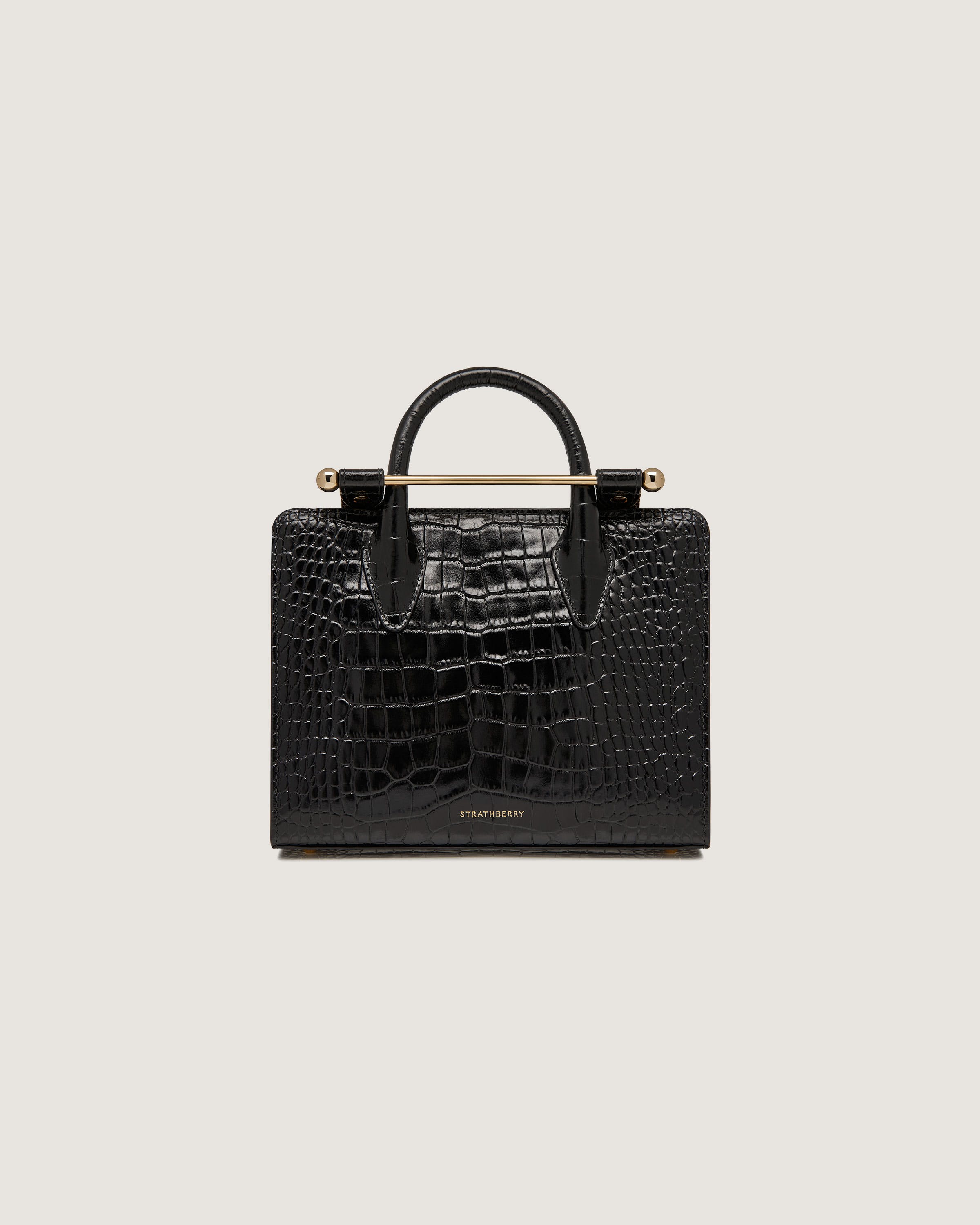 A black crocodile - embossed leather briefcase