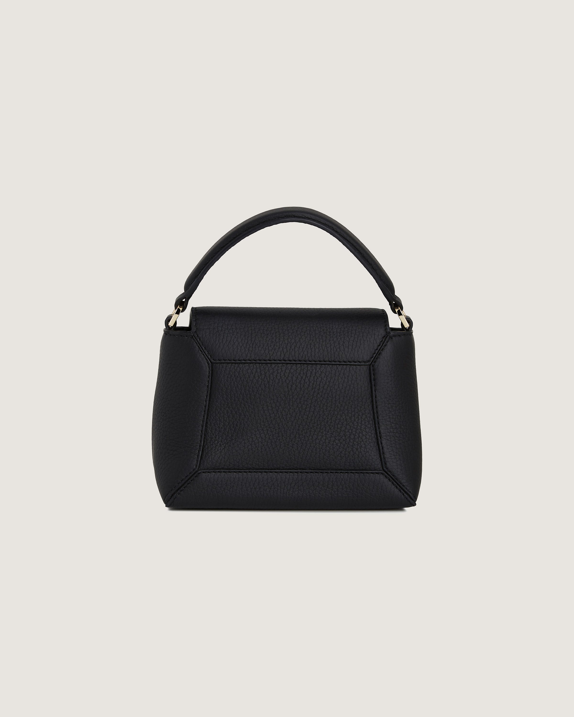 A black handbag on a white background