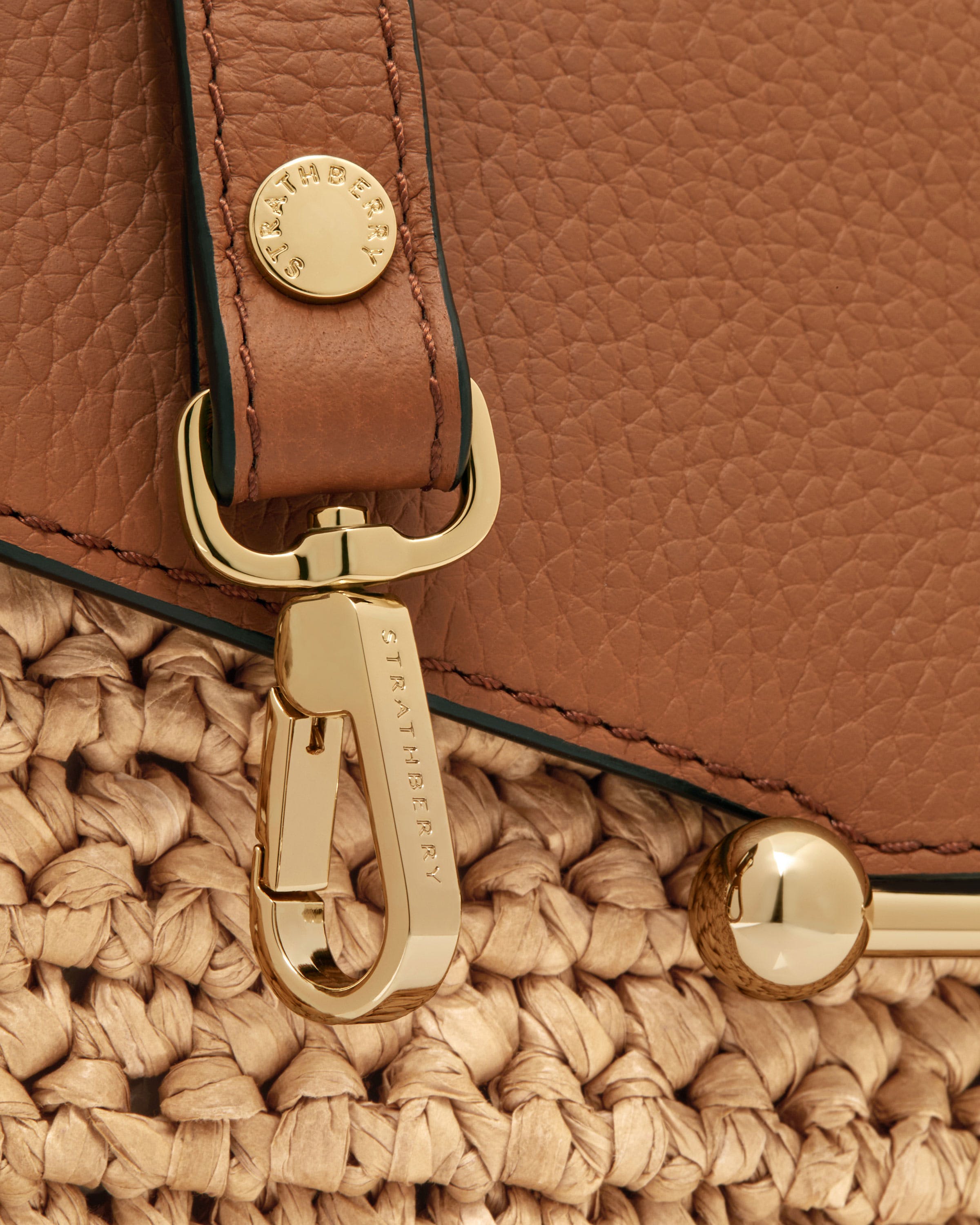 A close up of a purse with a handle