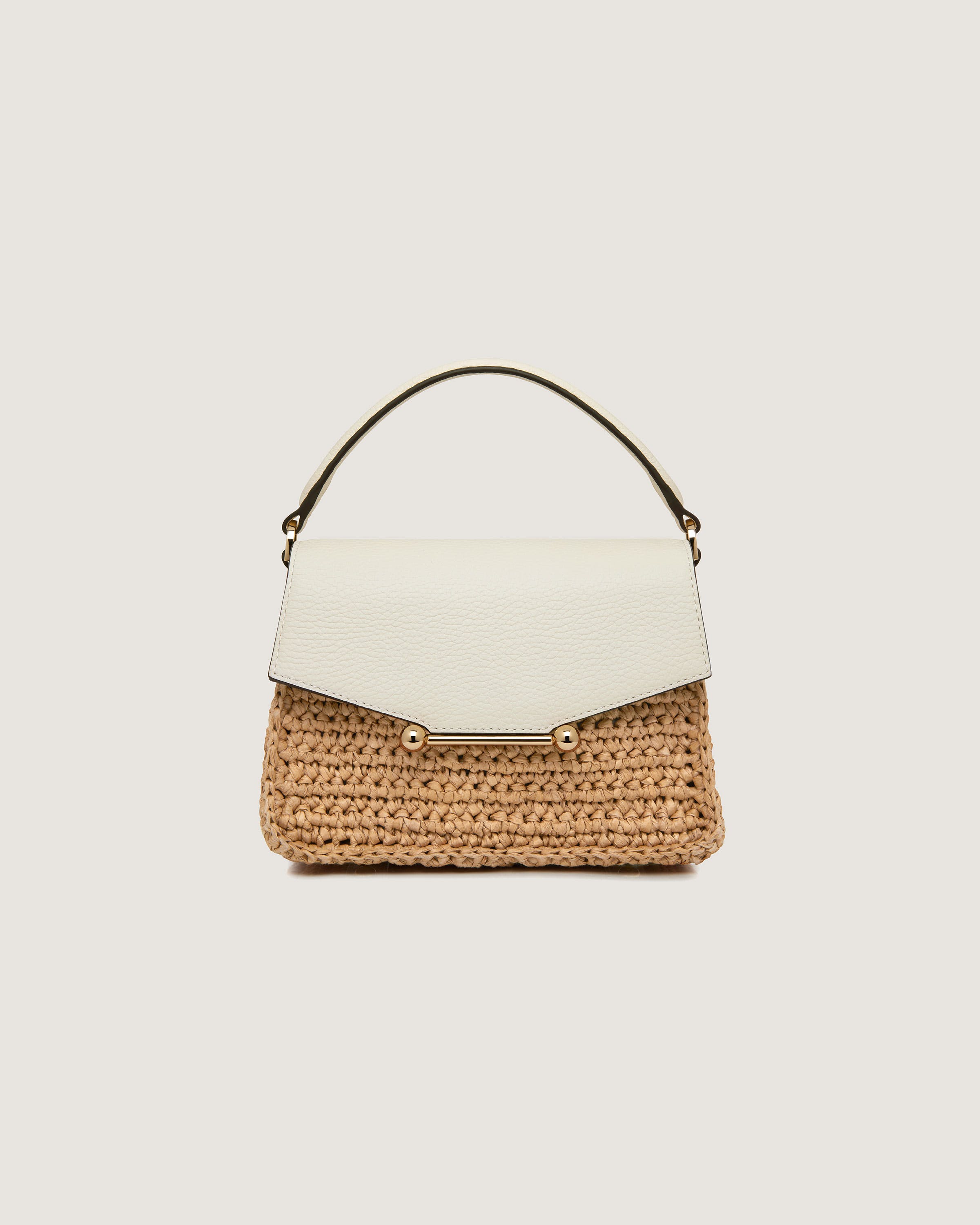 A white and brown handbag on a white background