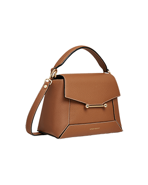 A brown handbag on a white background