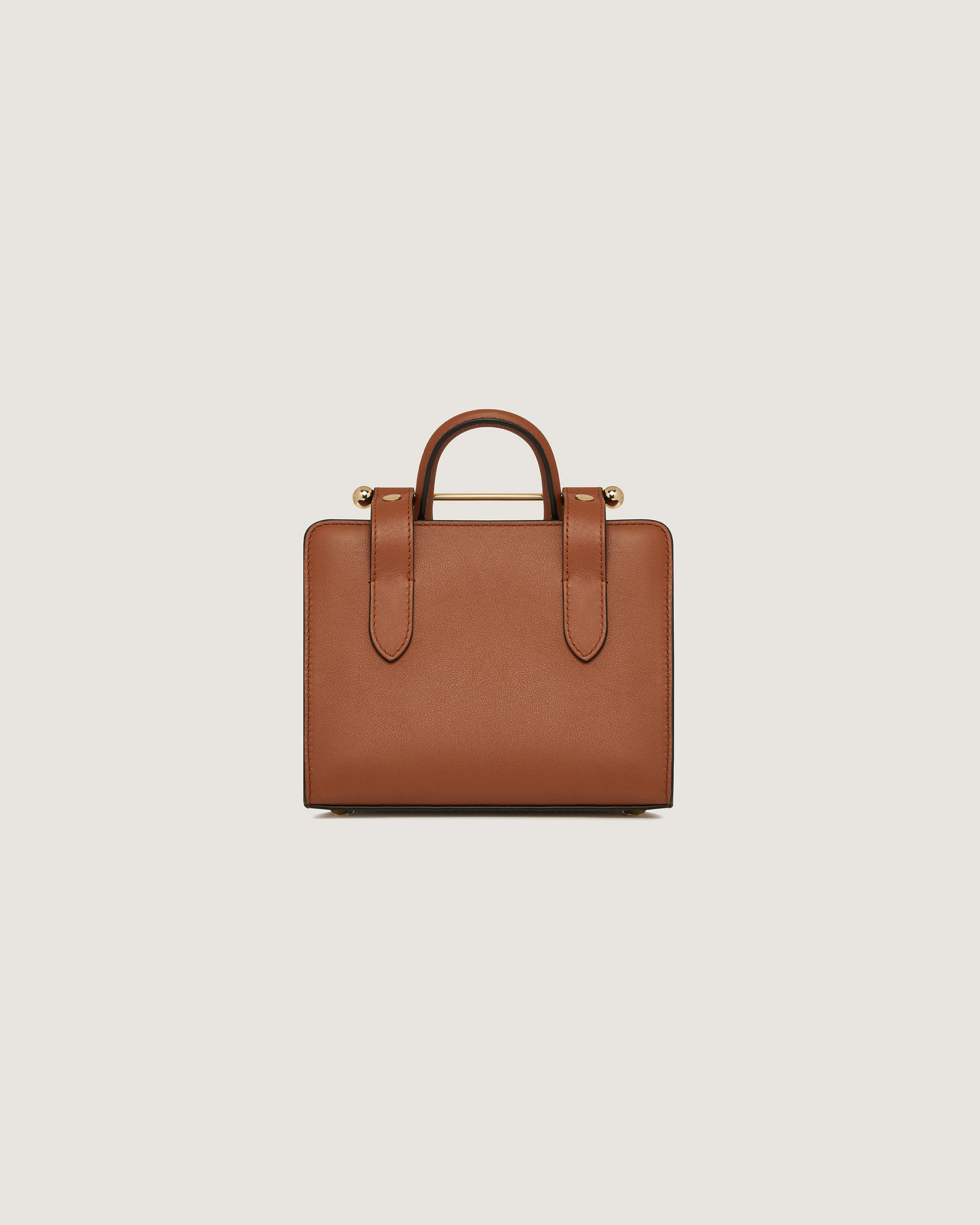 A brown leather briefcase on a white background