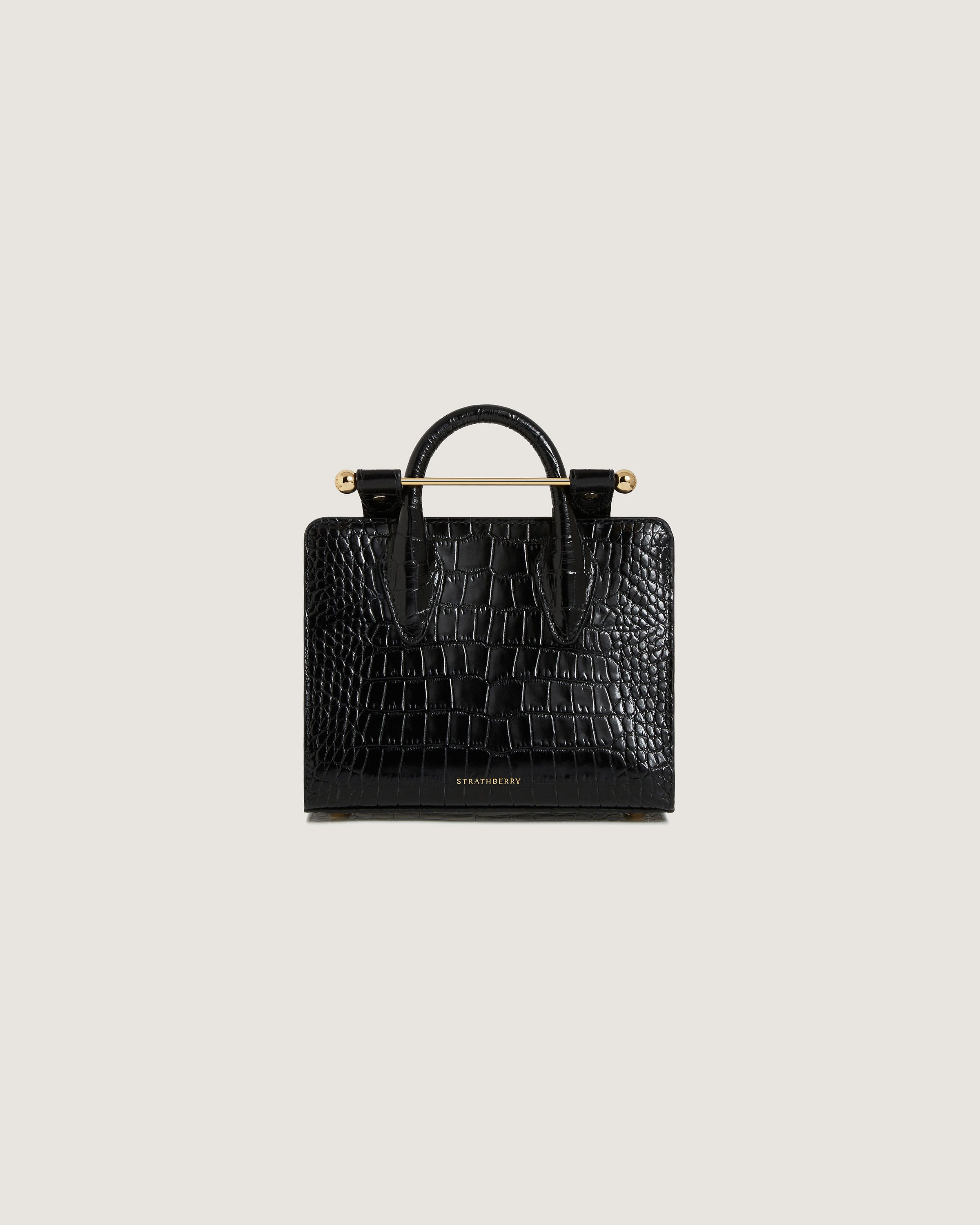 A black crocodile - embossed leather briefcase