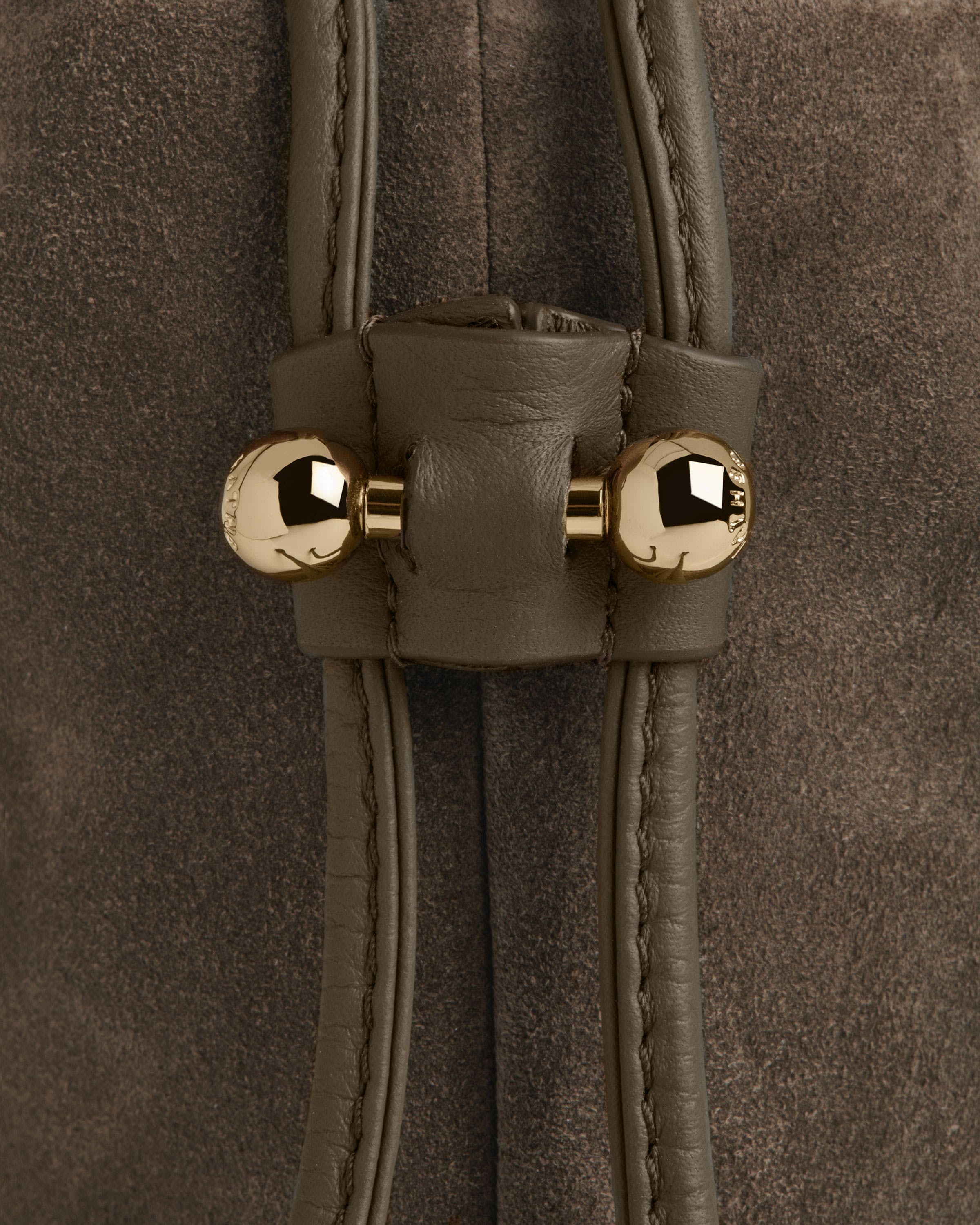 A close up of a brown leather bag