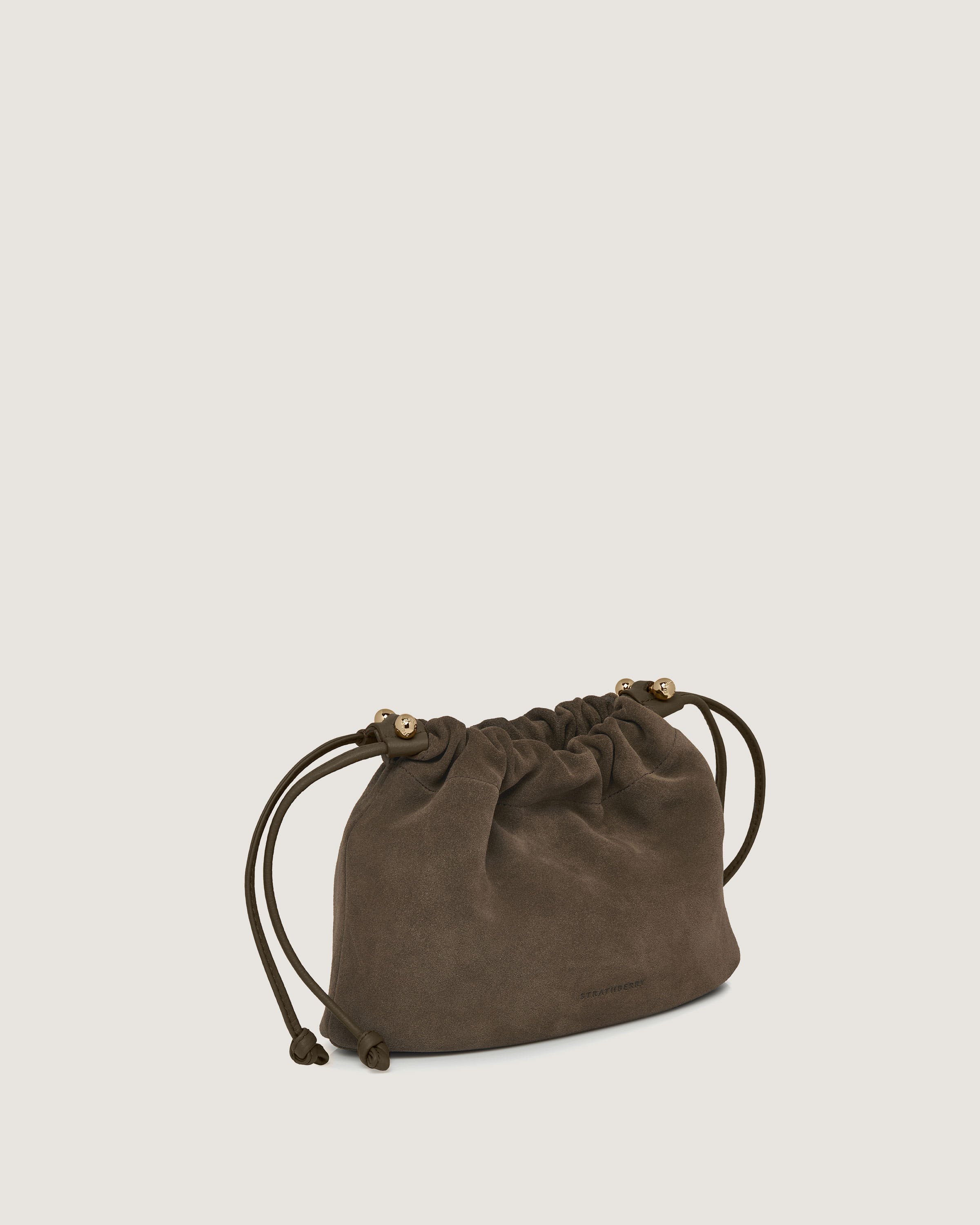 A small brown bag on a white background