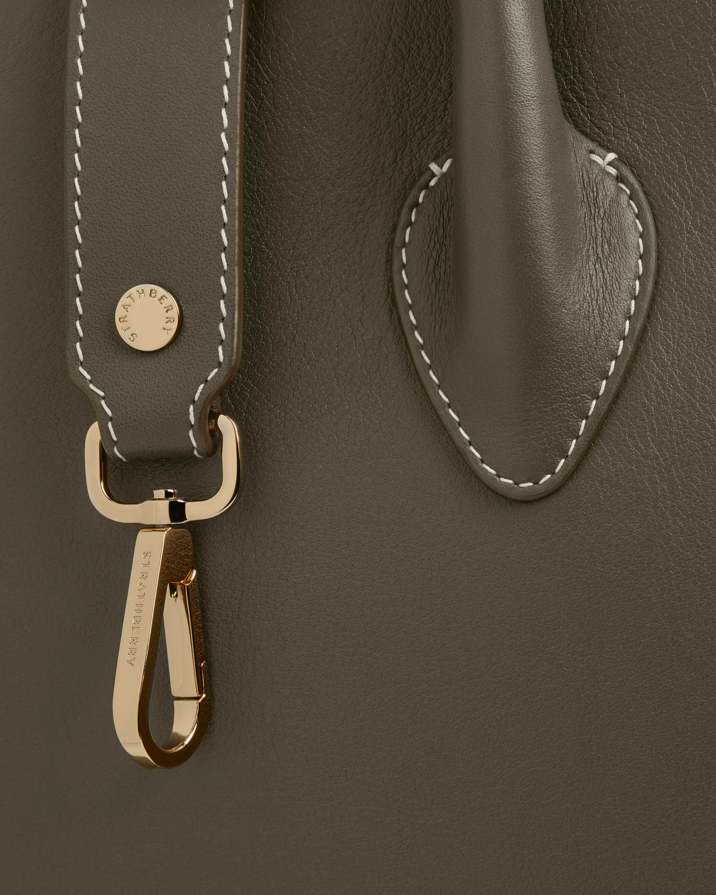 A close up of a handbag with a handle