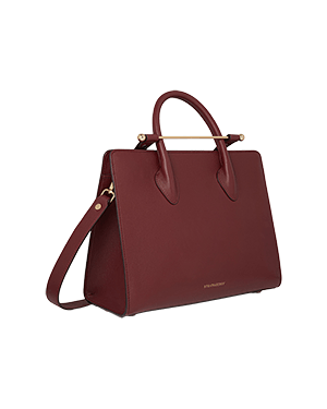 A red handbag on a white background