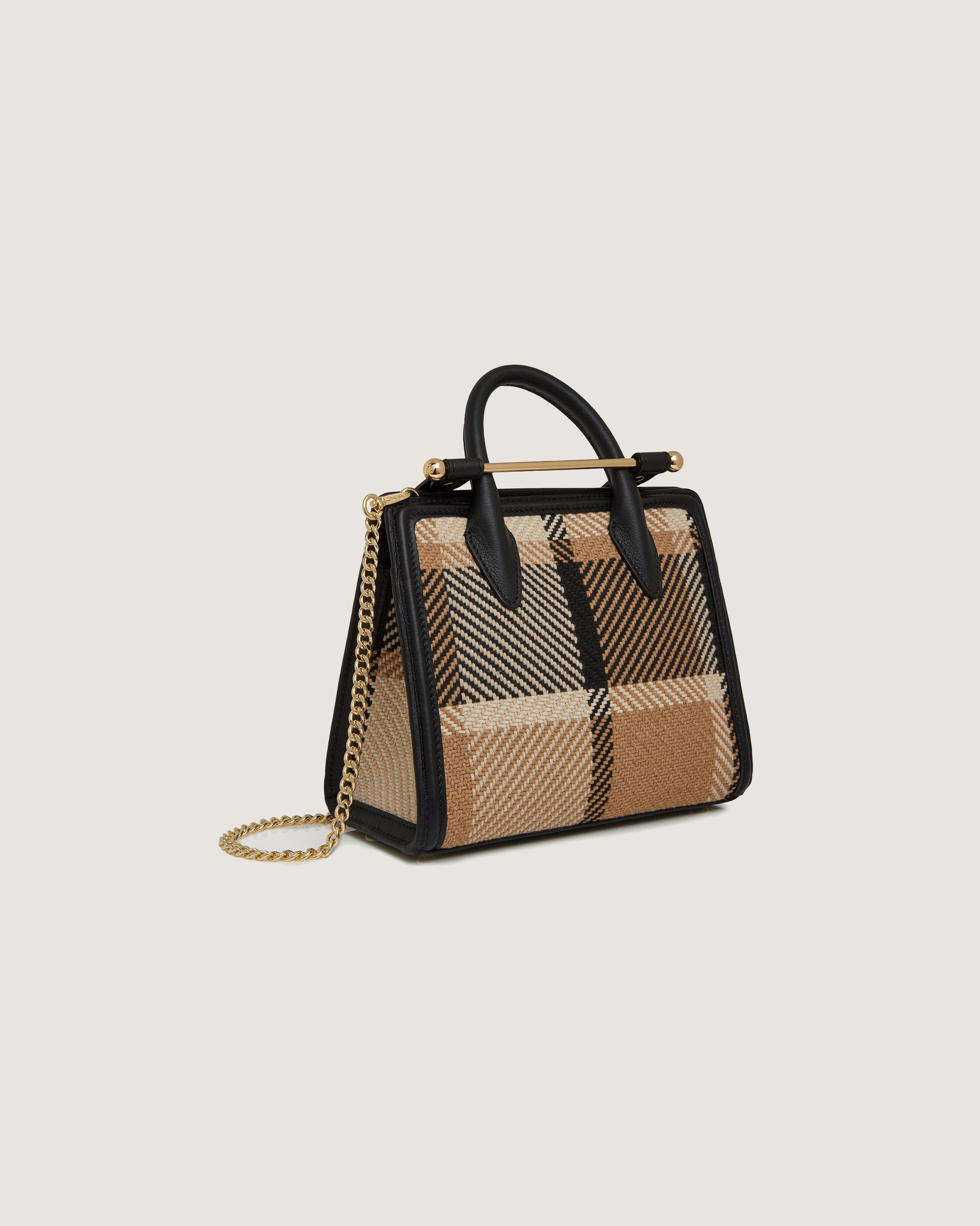 A small handbag with a check pattern