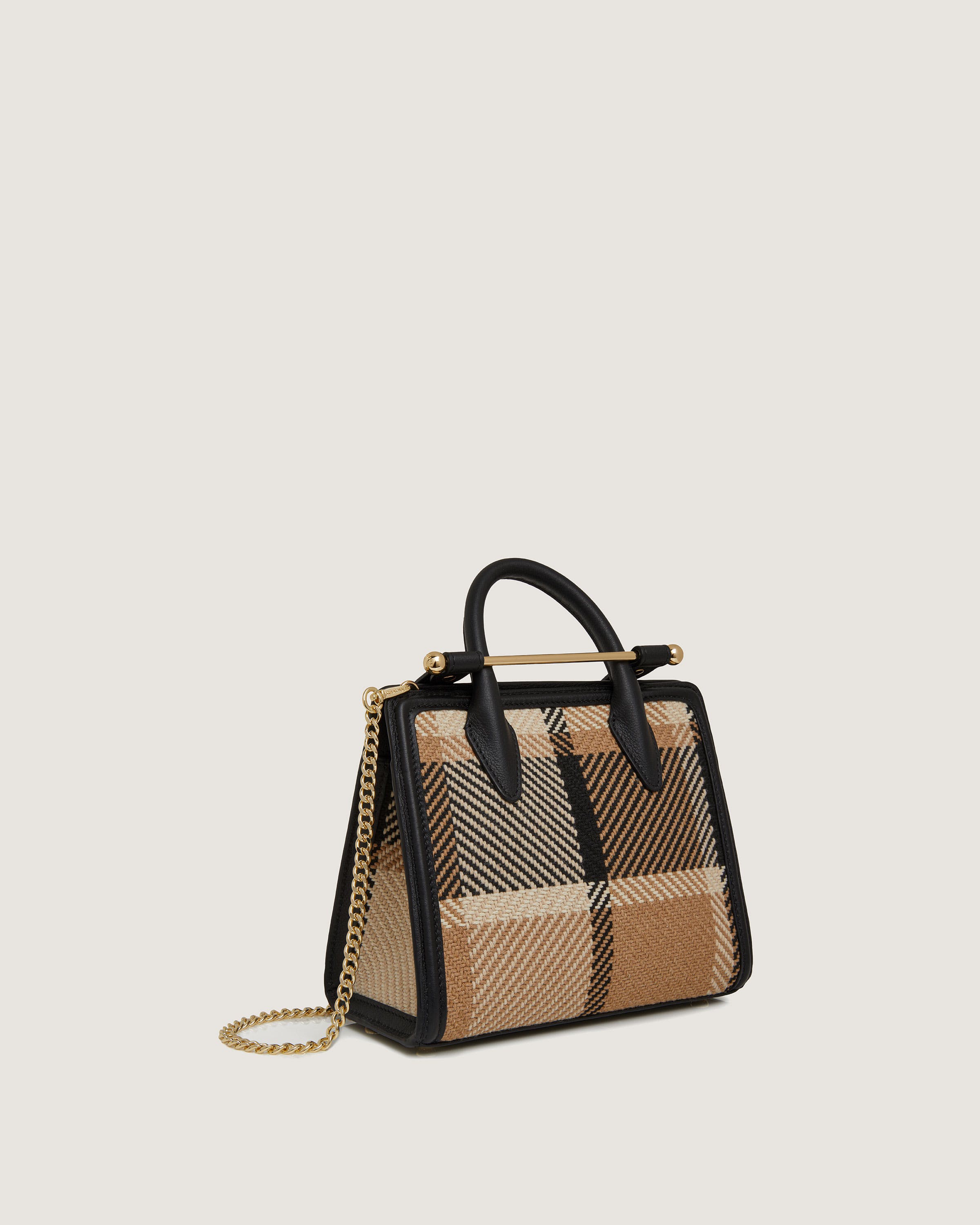 A small handbag with a check pattern