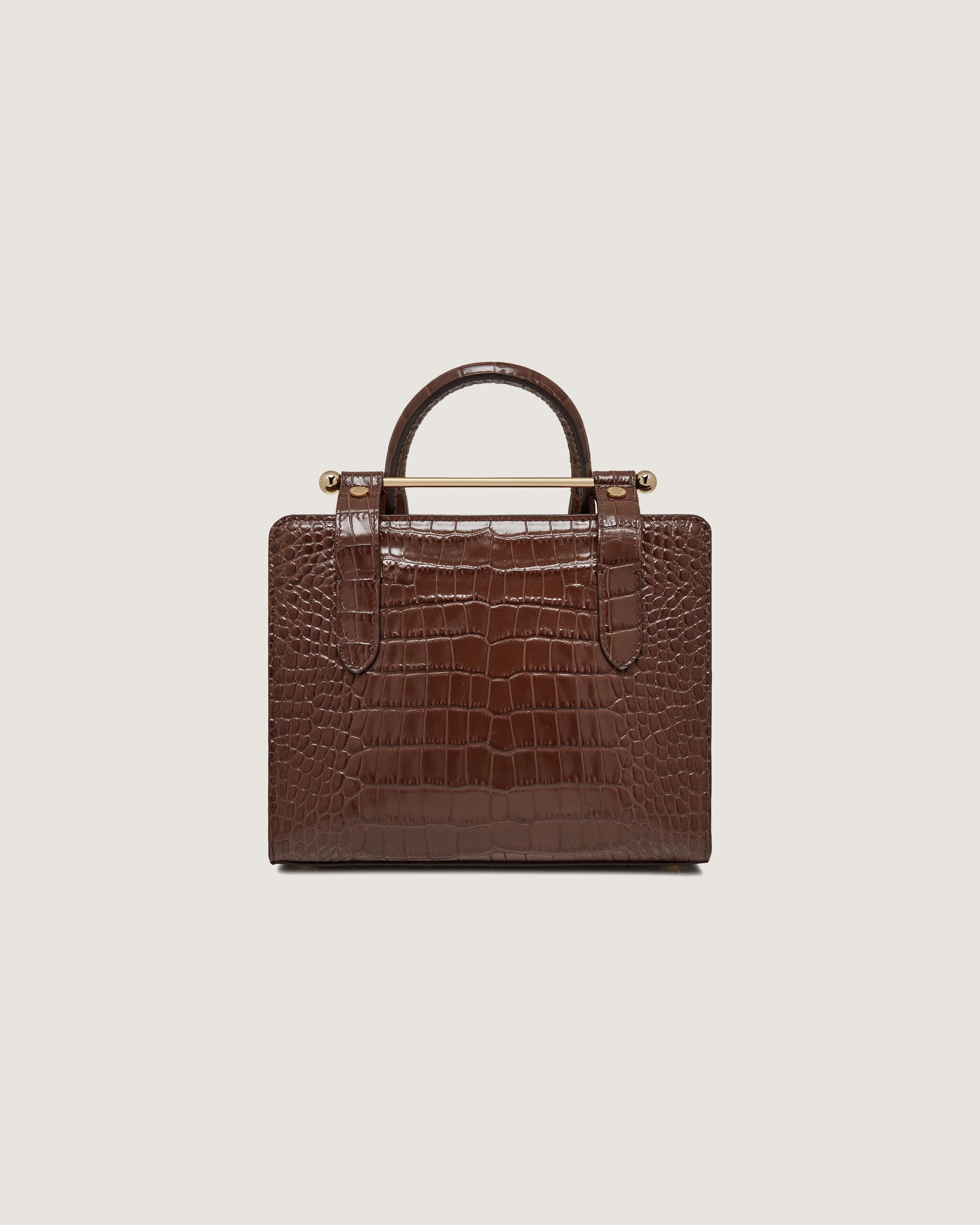 A brown crocodile - embossed leather briefcase