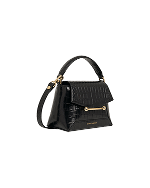 A black handbag on a white background