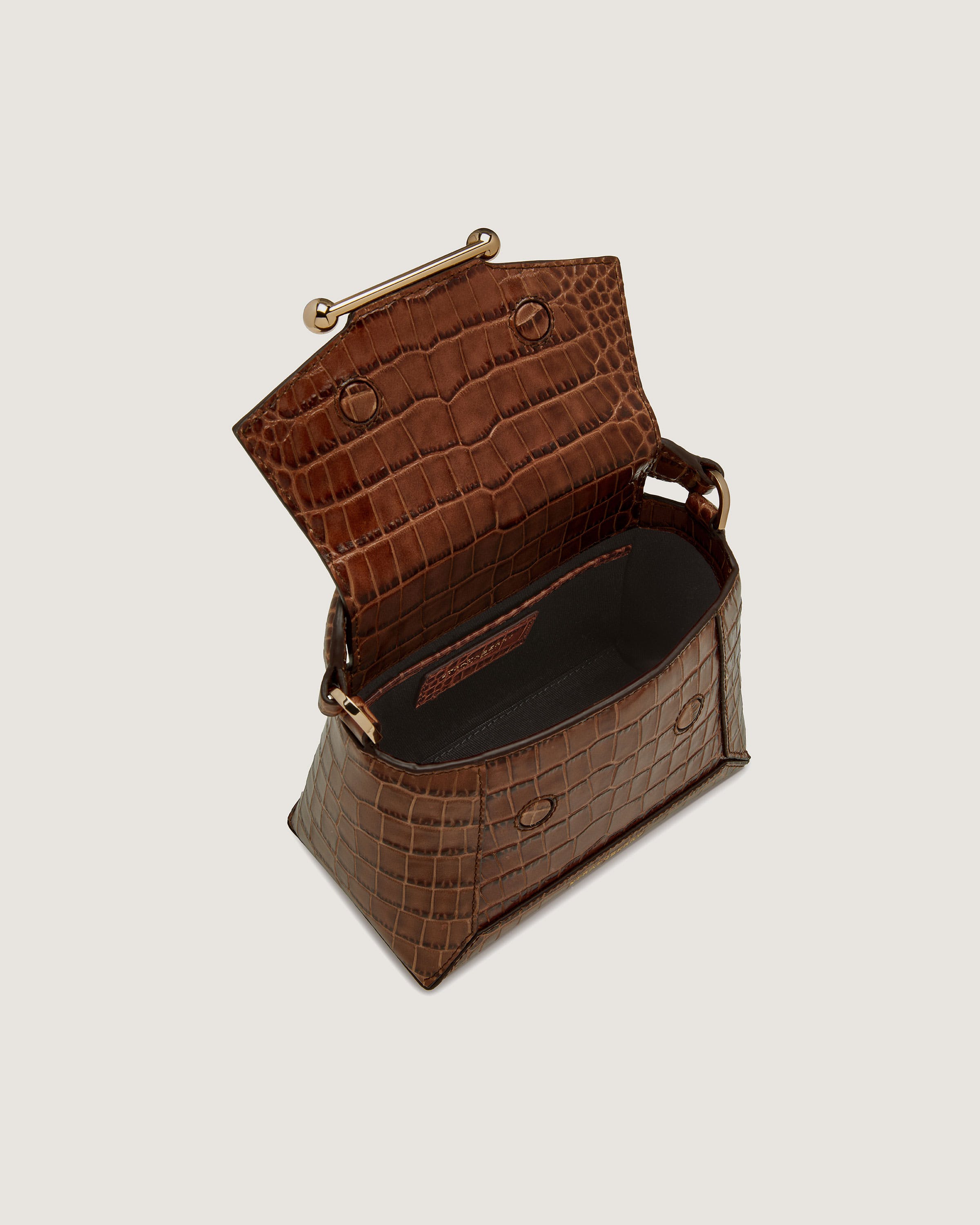 A brown crocodile - embossed leather purse