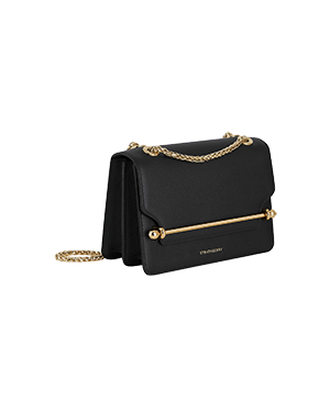 A black handbag with a gold chain strap