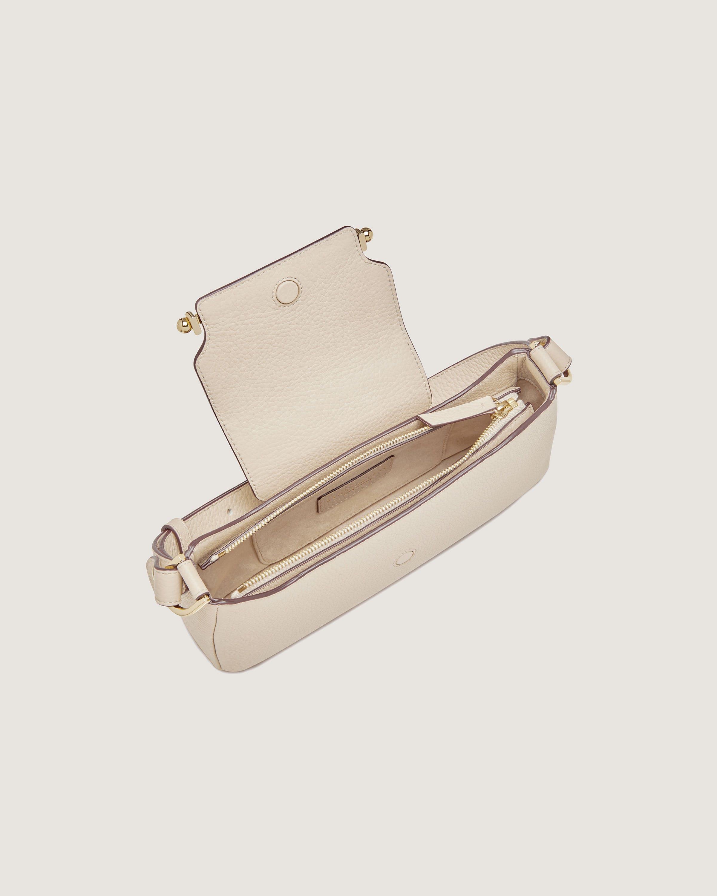 A white purse with a handle on a white background