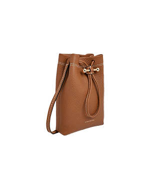 A brown handbag with a bow on the handle