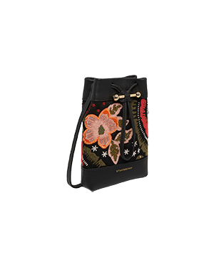 A small black bag with flowers on it