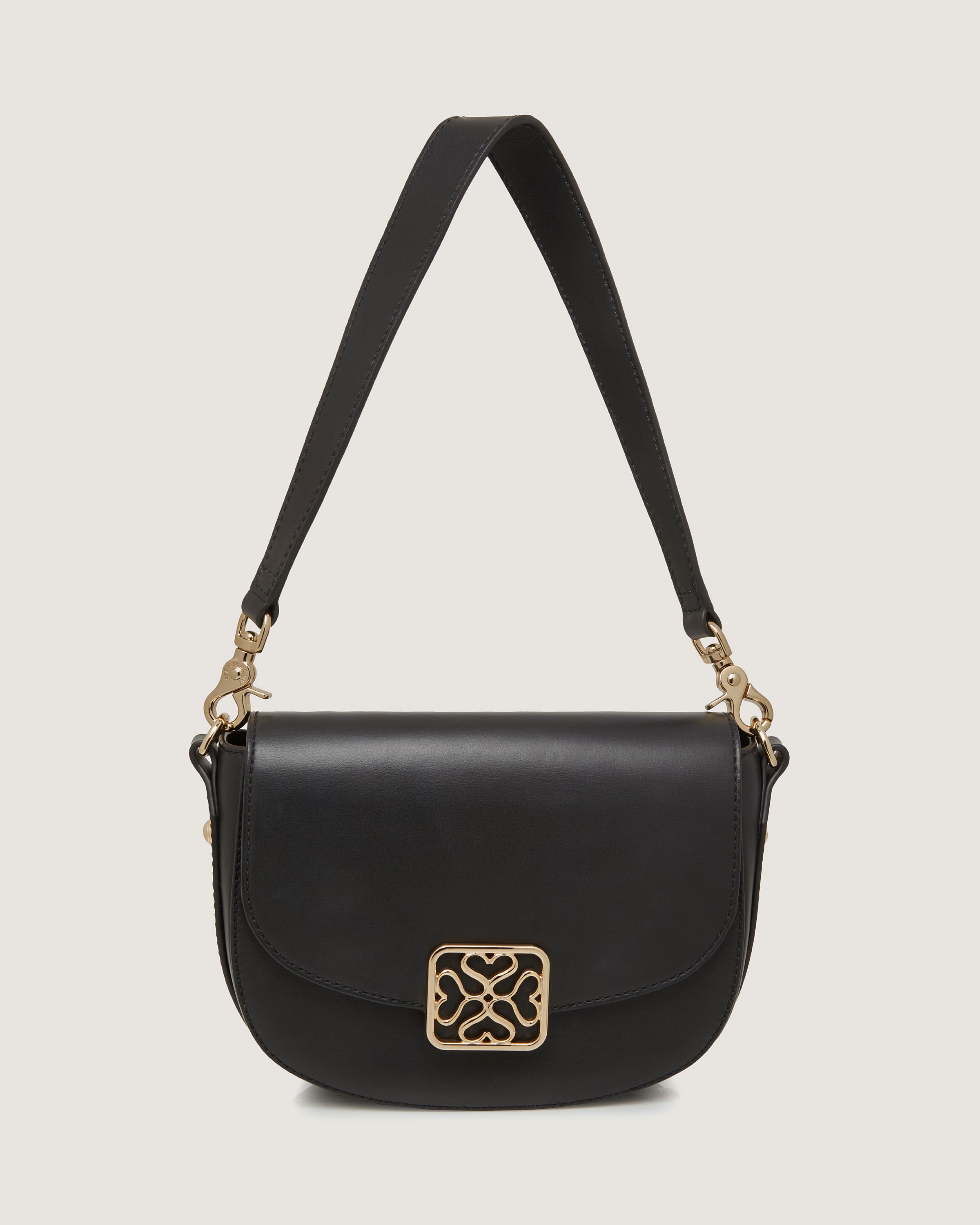 A black bag with a gold buckle