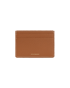 A tan leather card holder