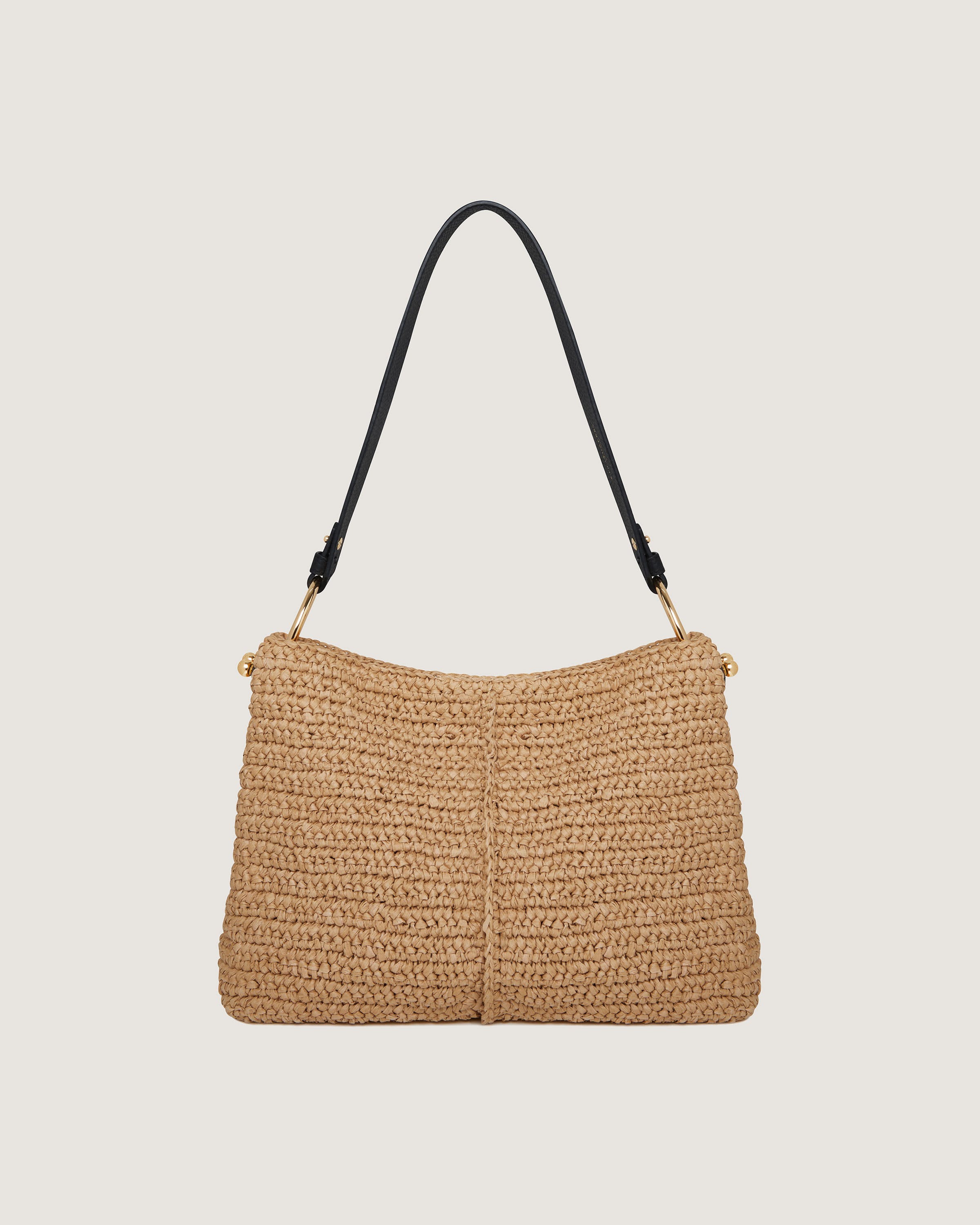 A straw bag on a white background