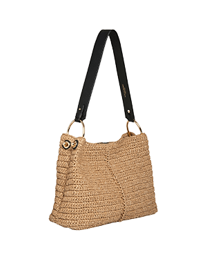 A straw bag with a black strap