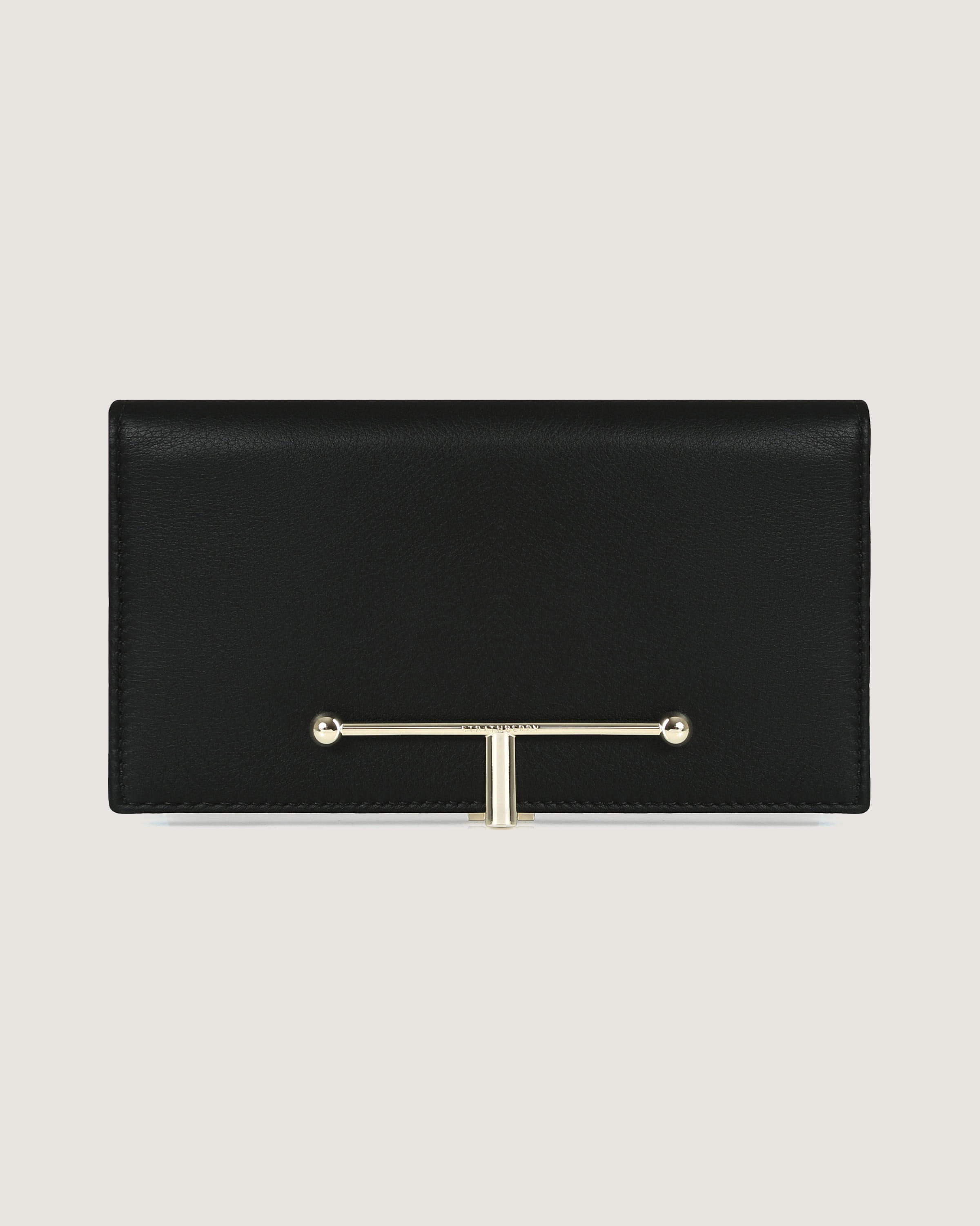 A black leather wallet with a metal bar on the front