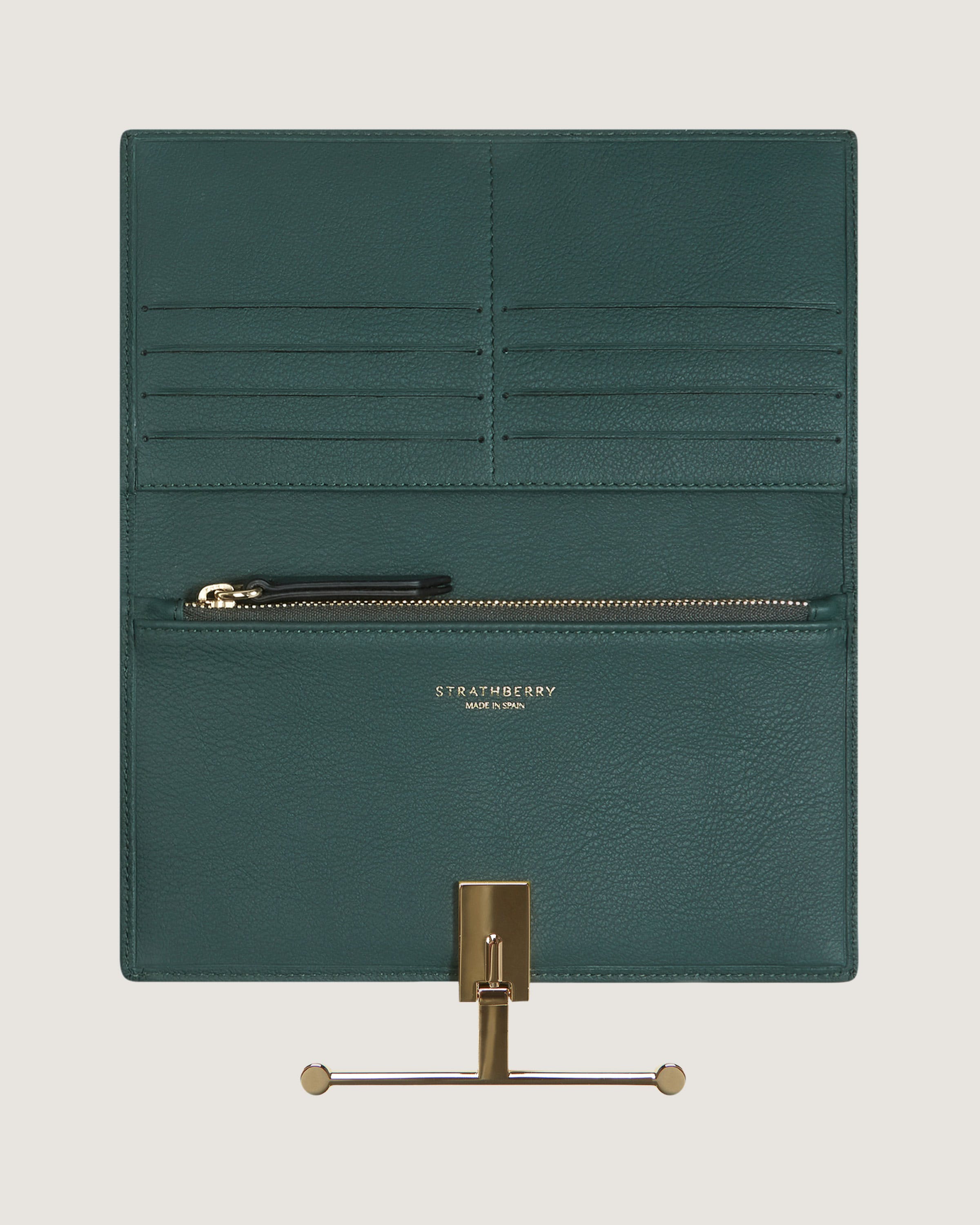 A green leather wallet with a metal hook