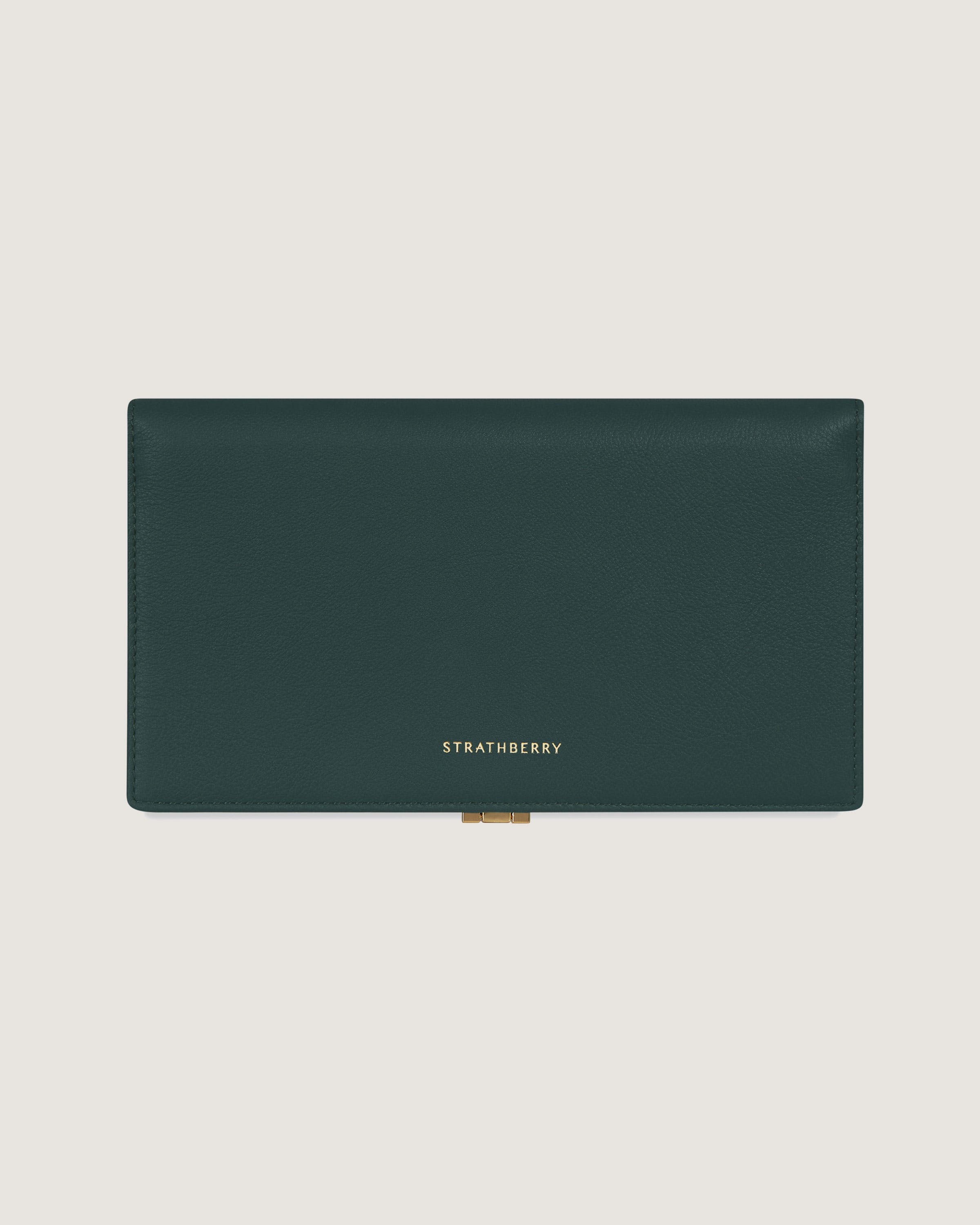 A green leather wallet on a white background