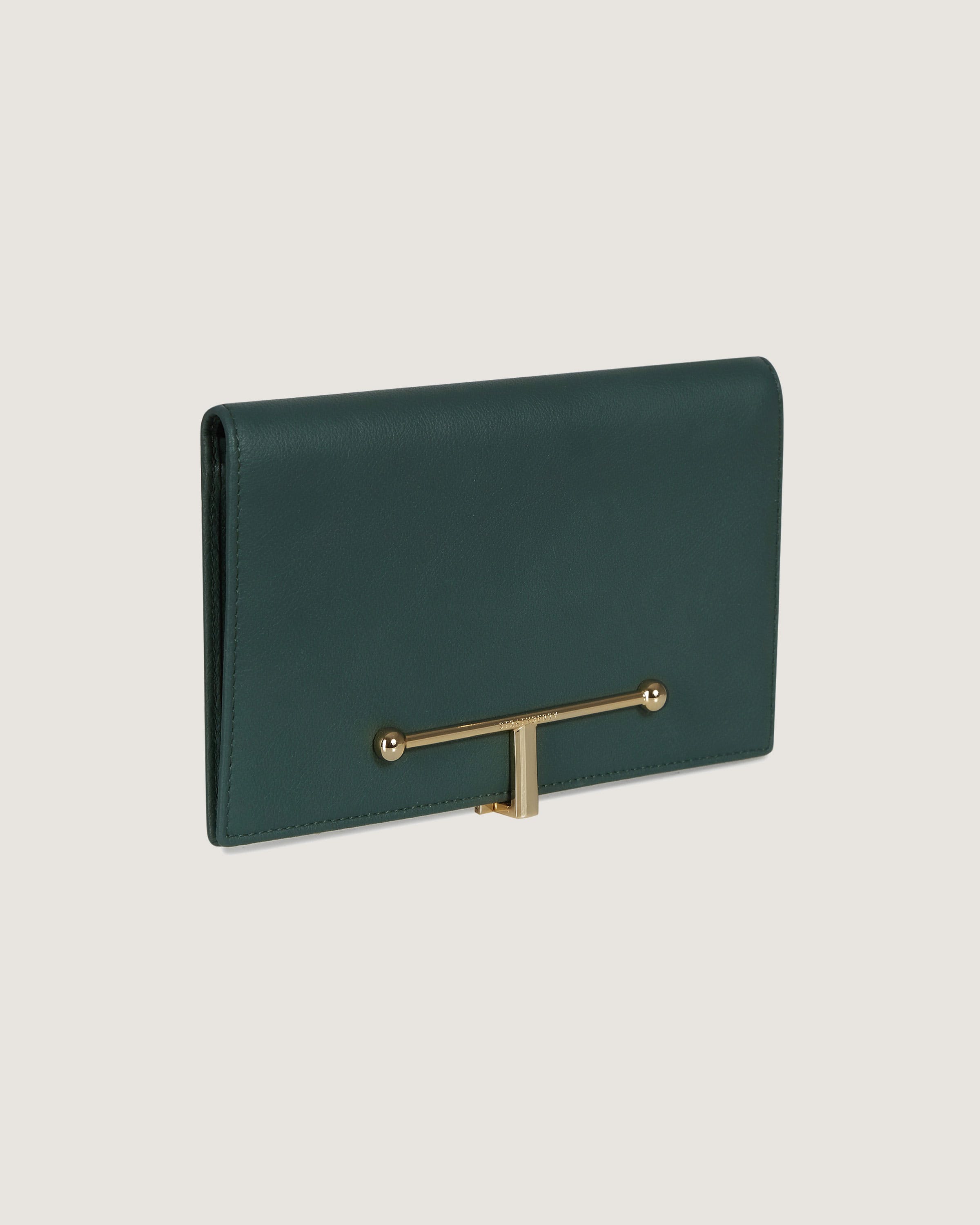 A green leather purse with a gold handle