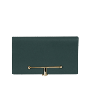 A black leather purse with a gold handle