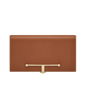 A brown leather wallet with a gold handle