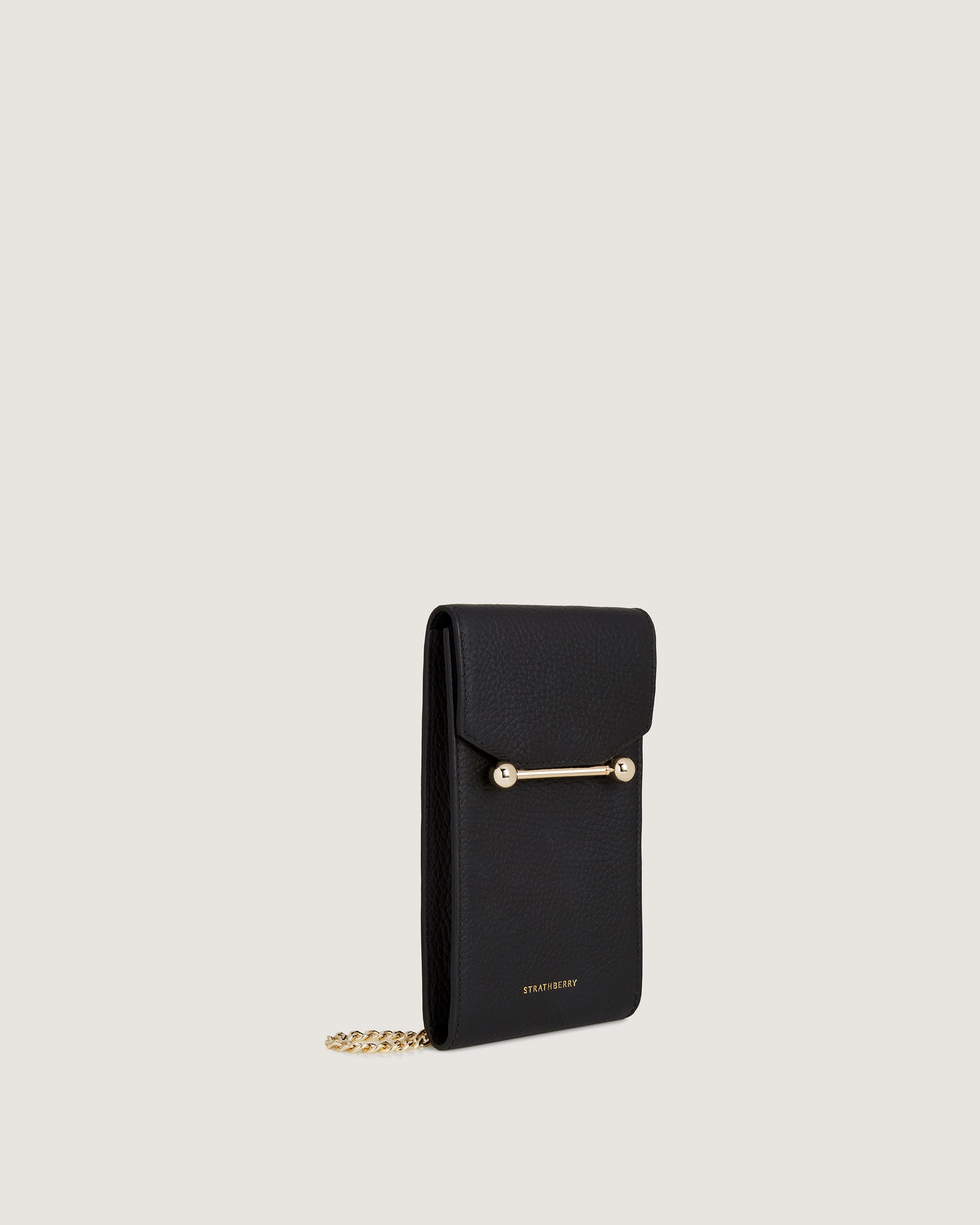 A black wallet with a gold chain hanging from it