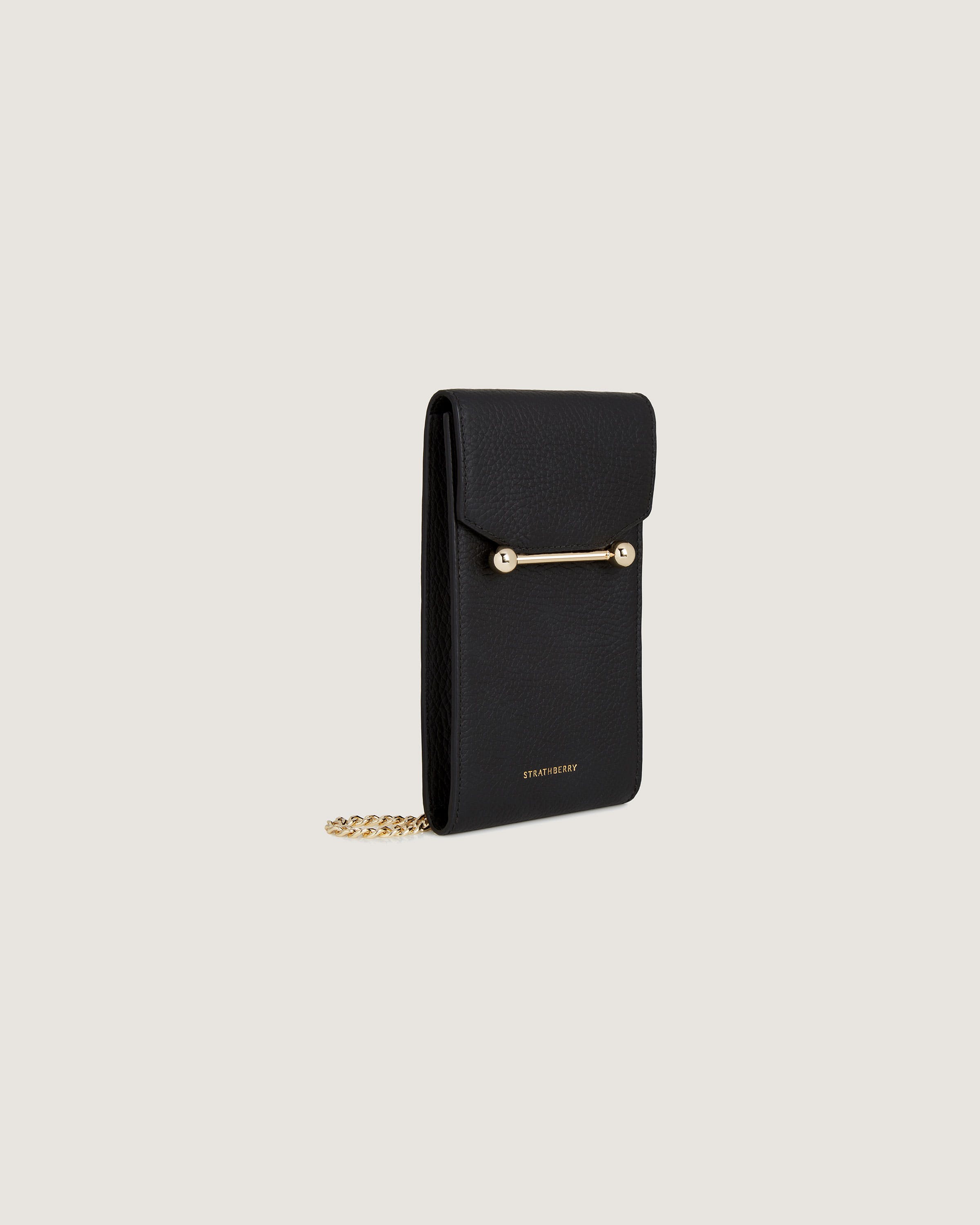 A black wallet with a gold chain hanging from it