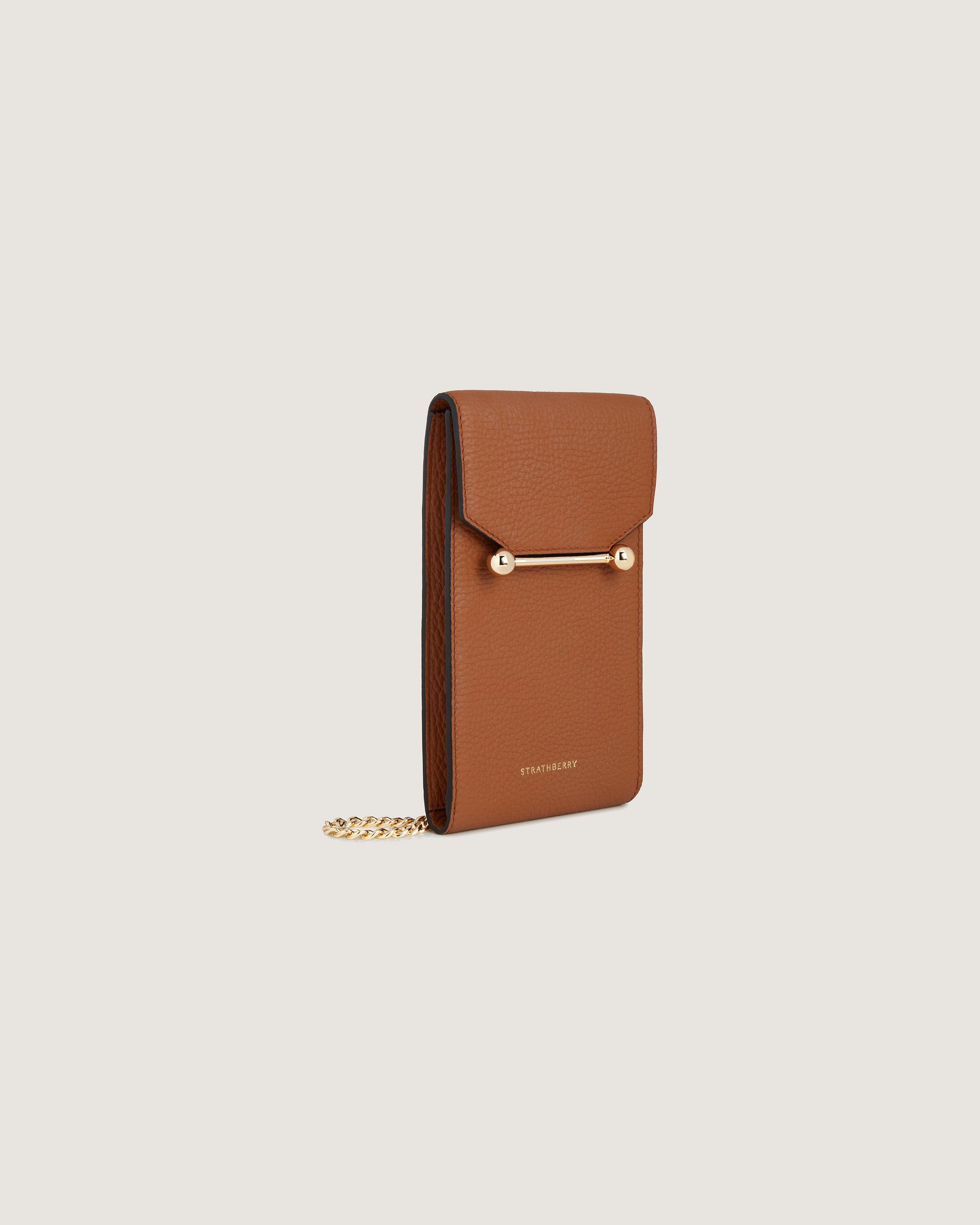 A brown wallet with a chain hanging from it