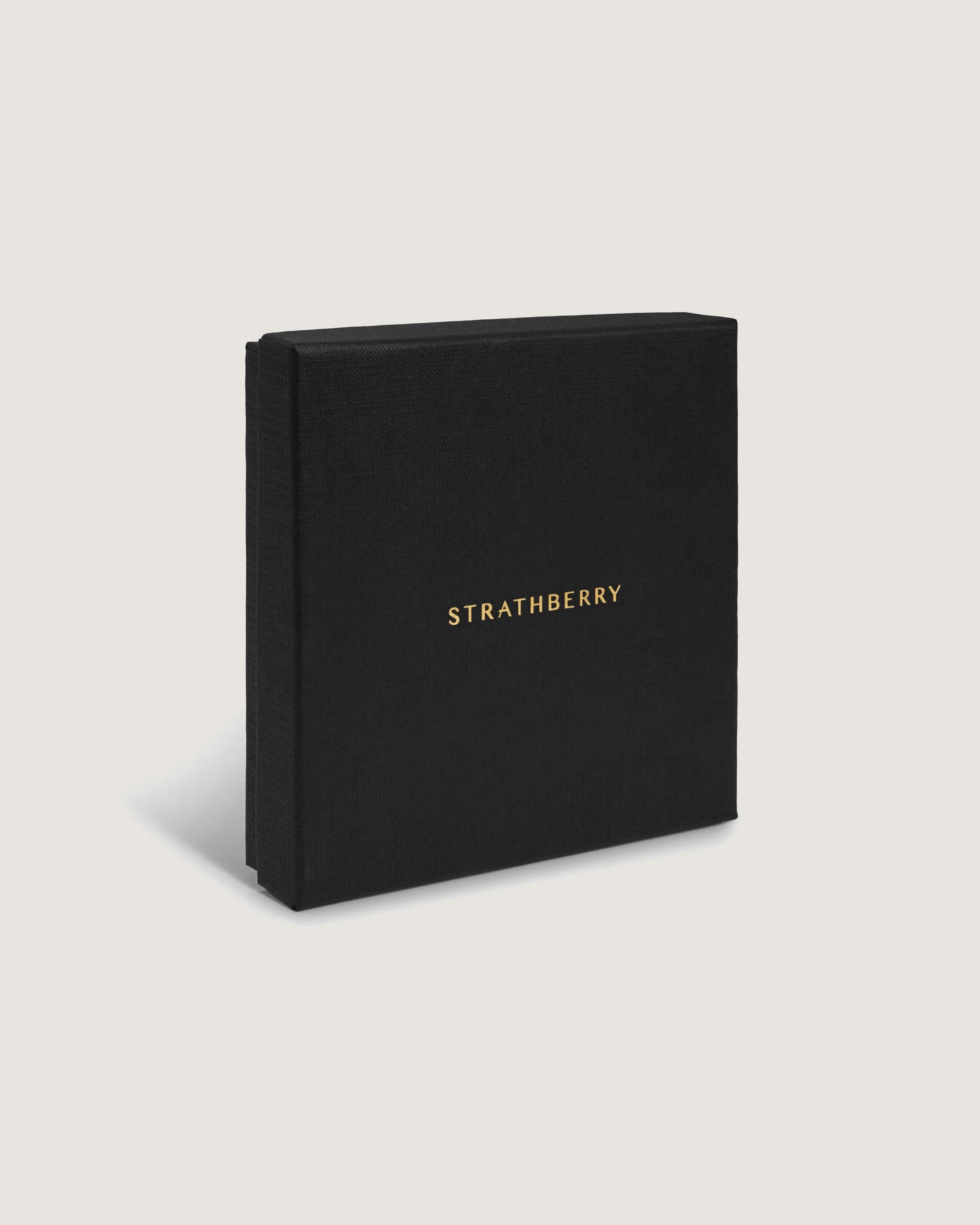 A black book with gold lettering on it