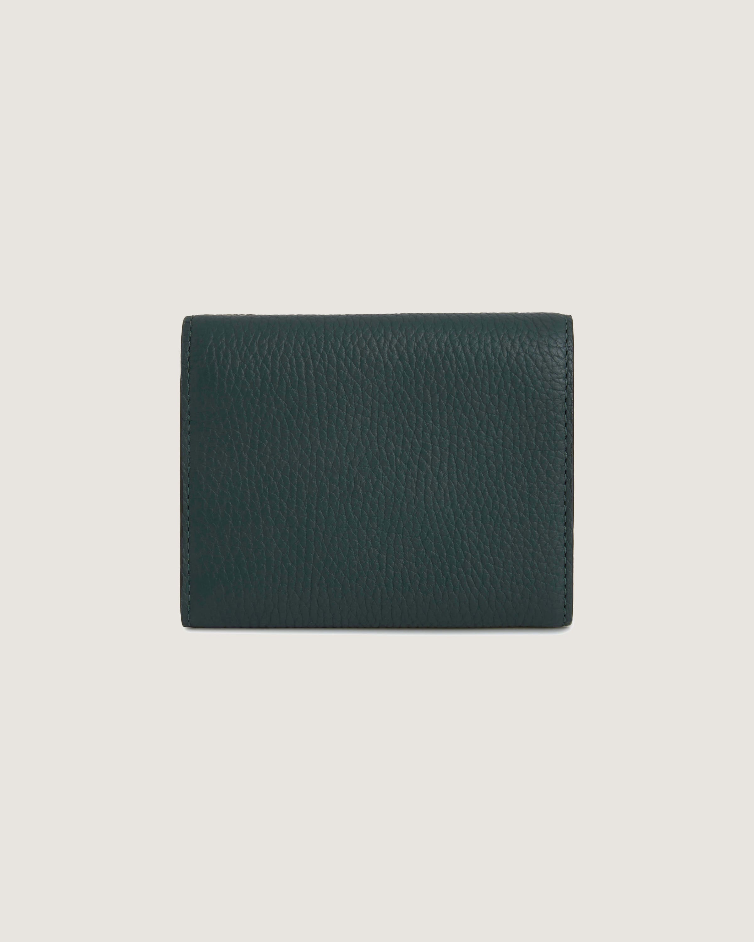 A green leather wallet on a white background