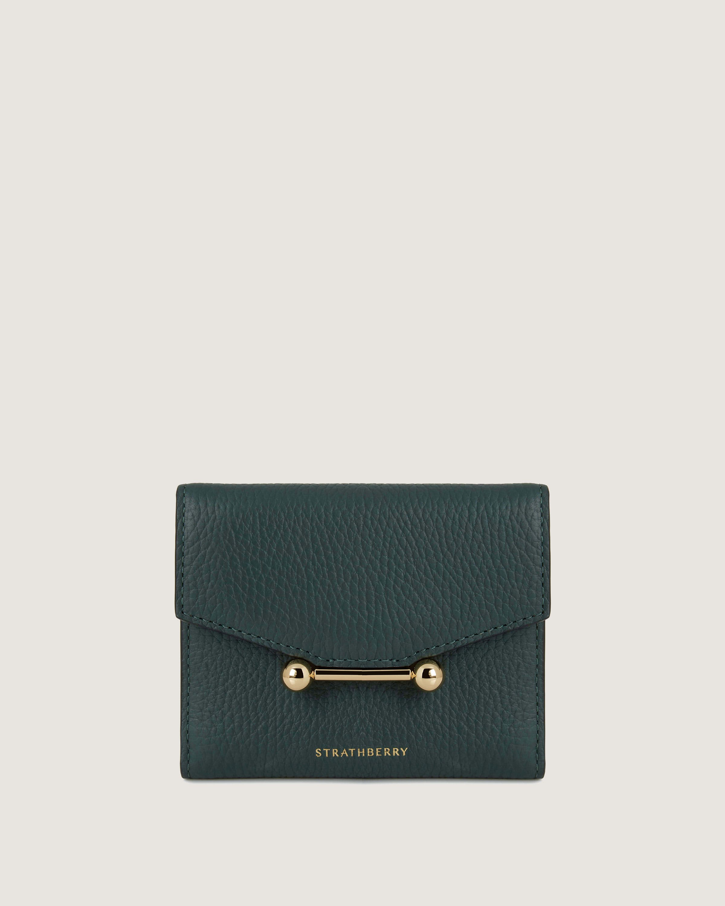 A green leather wallet with a gold handle