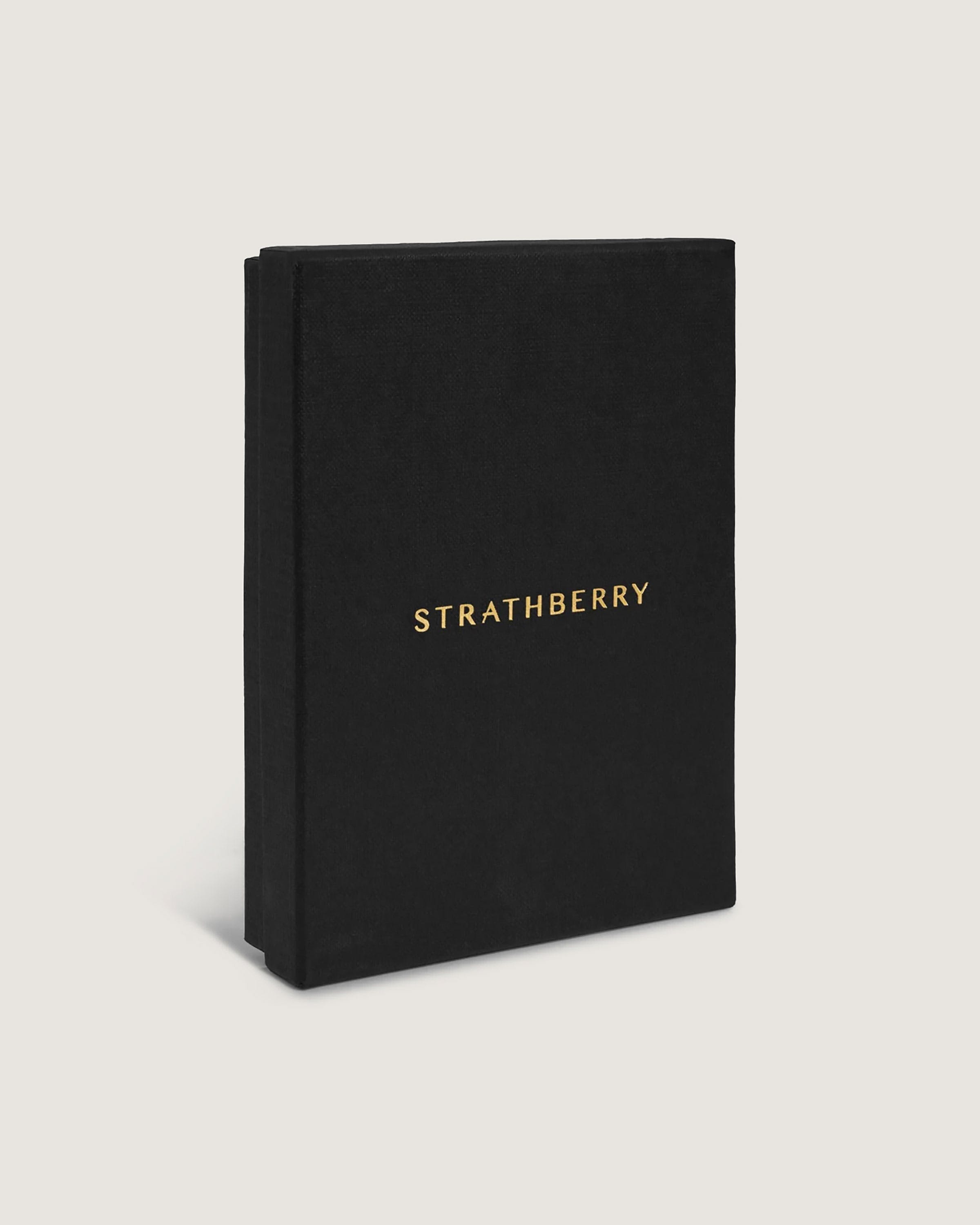 A black book with gold lettering on the cover